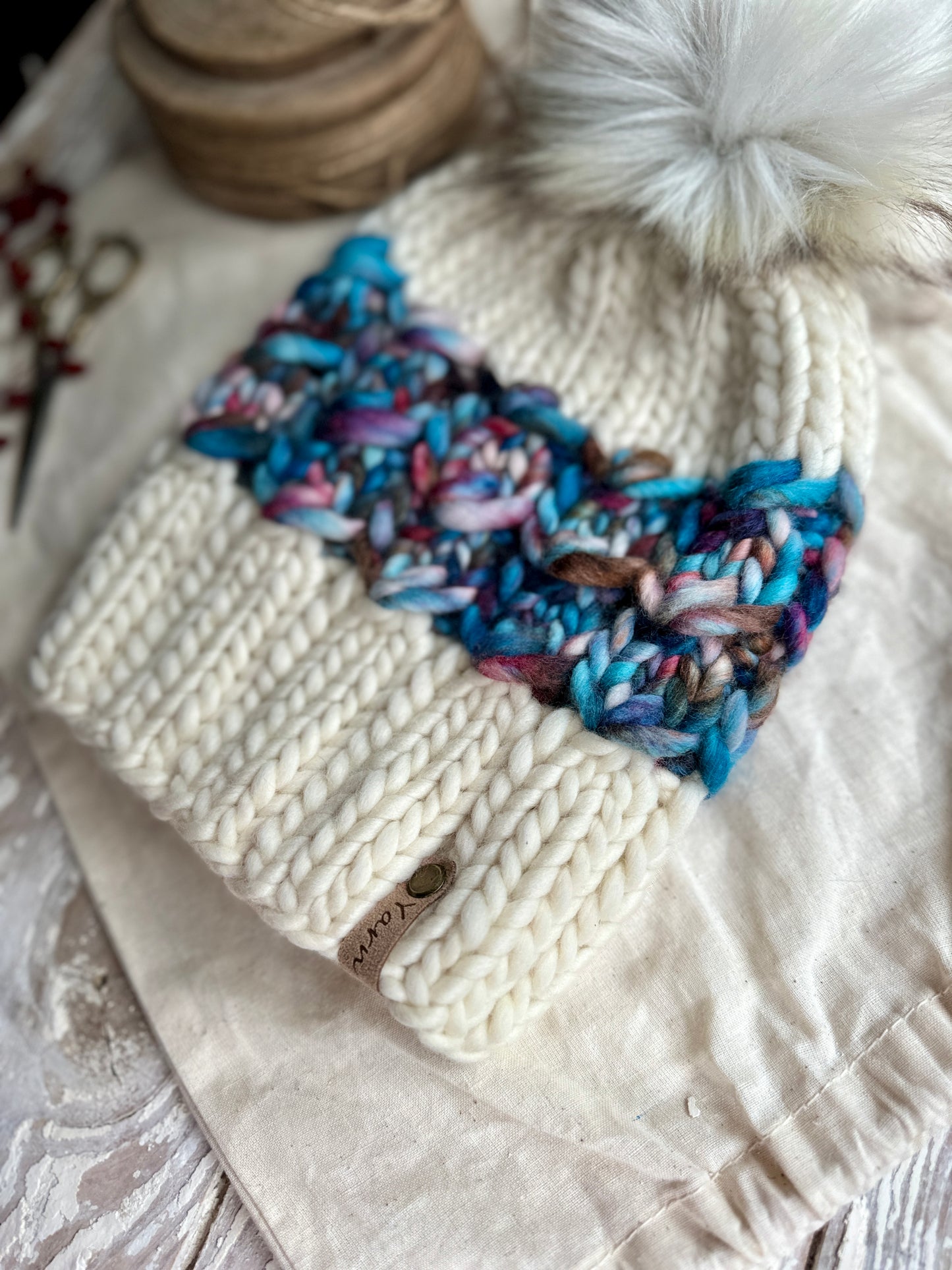 Merino wool knit hat with faux fur Pom