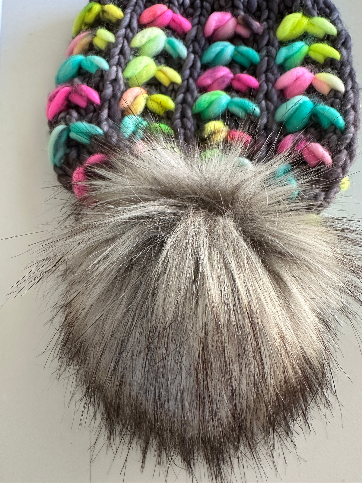 Merino wool knit hat with faux fur Pom