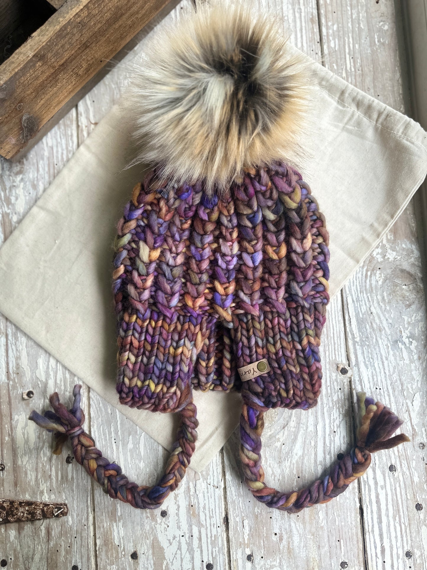 Merino wool split brim hat with faux fur Pom