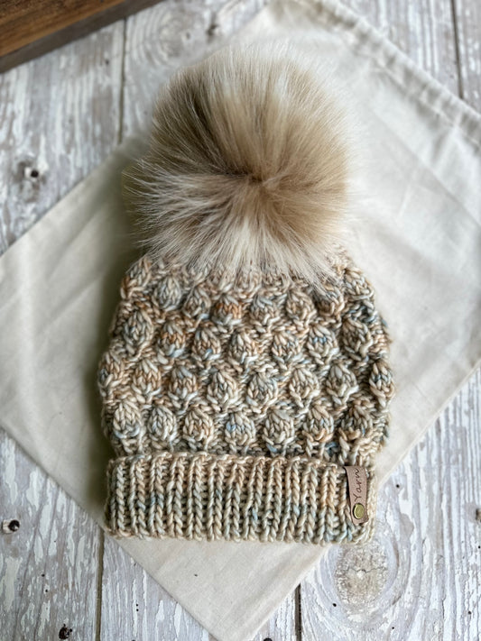 Merino wool folded brim knit beanie with faux fur pom