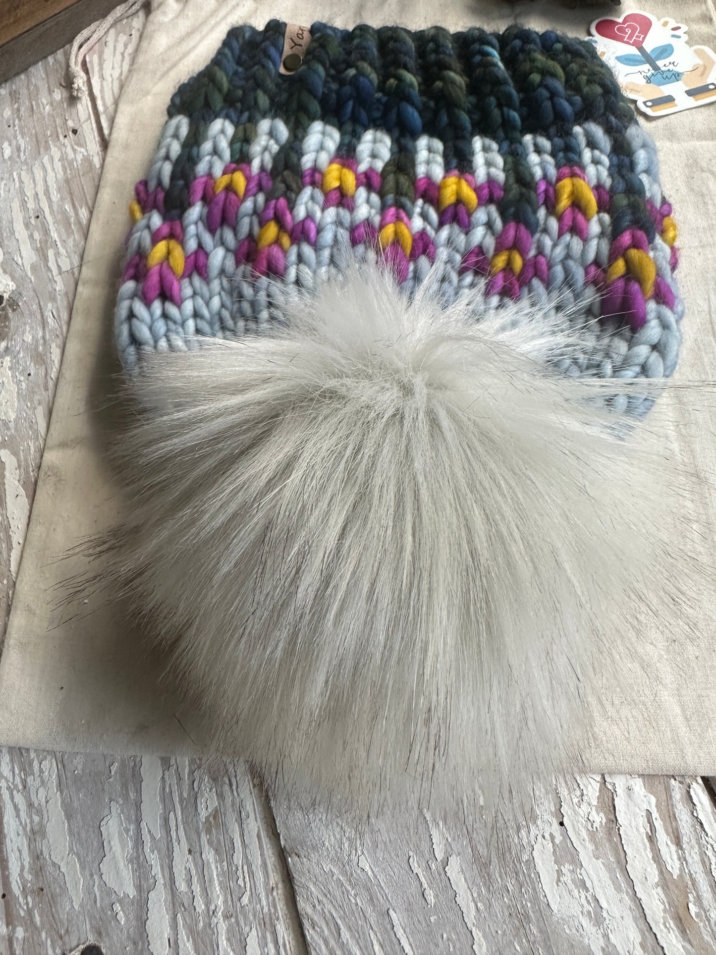 Merino wool knit hat with faux fur Pom