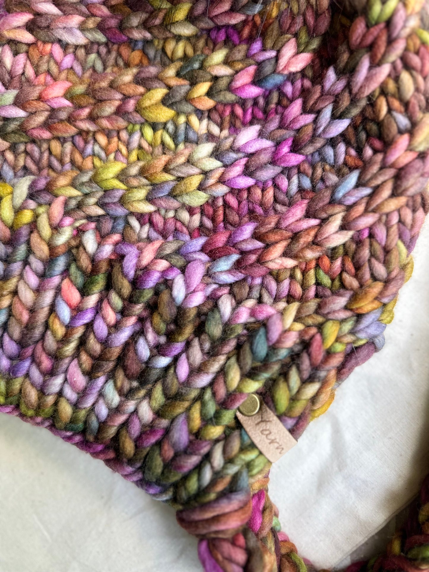 Merino wool split brim knit beanie with faux fur pom
