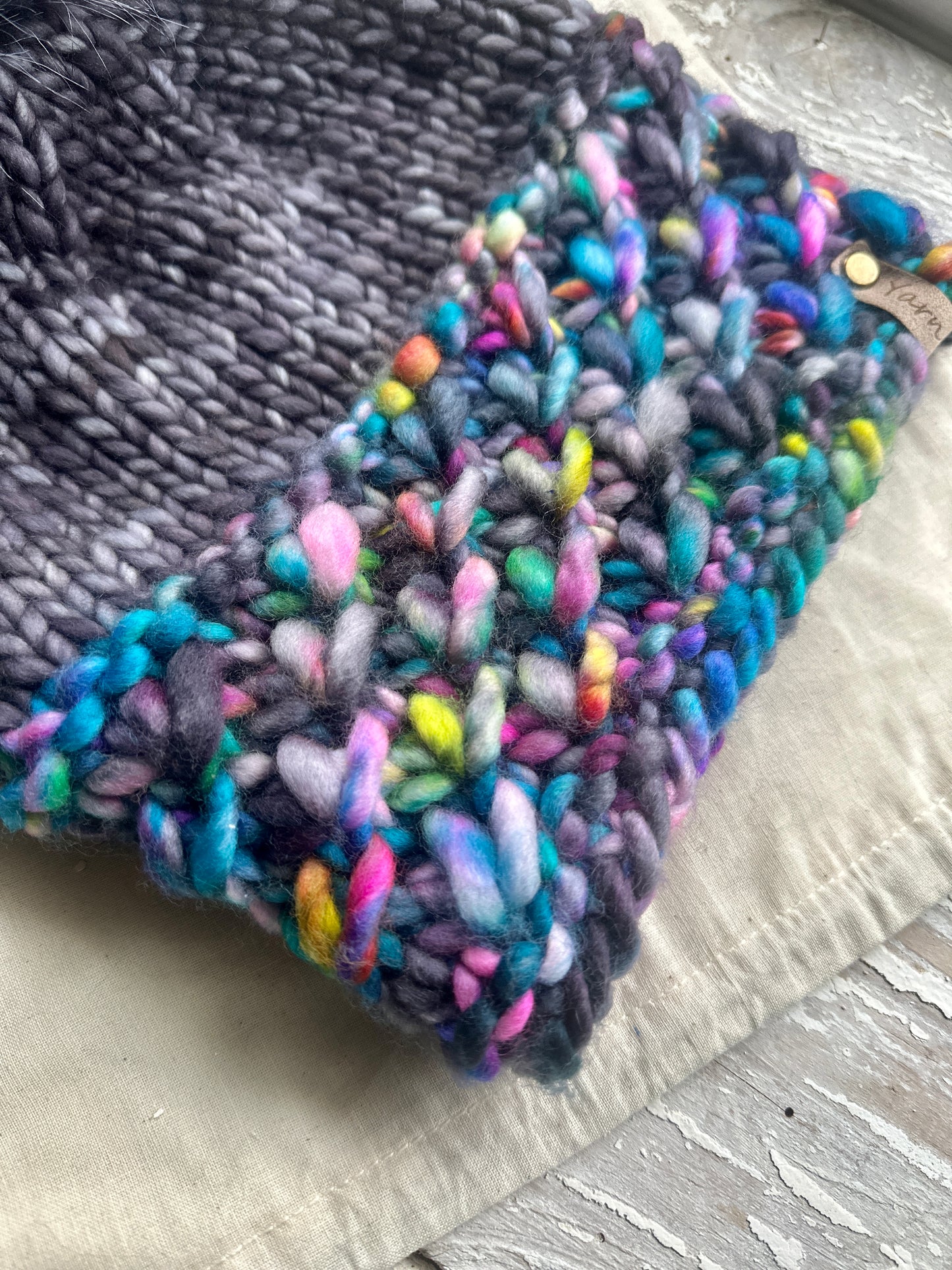 Merino wool knit hat with faux fur Pom