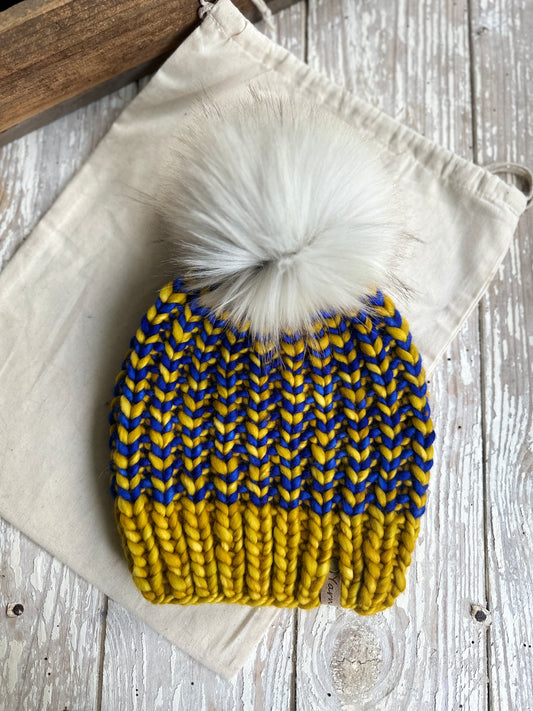 Merino wool knit hat with faux fur Pom