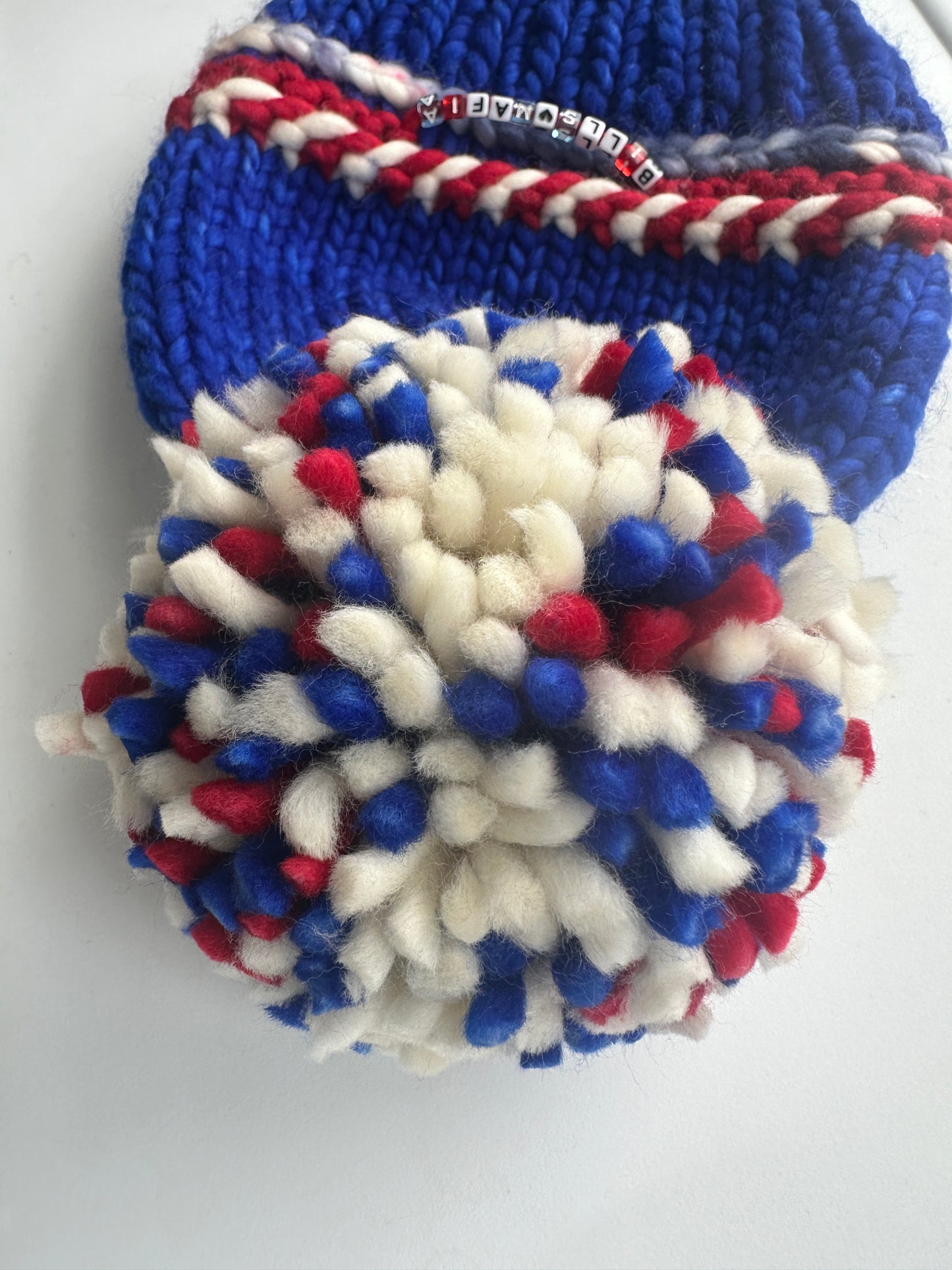 Sports Themed friendship bracelet merino wool hat with merino wool pom