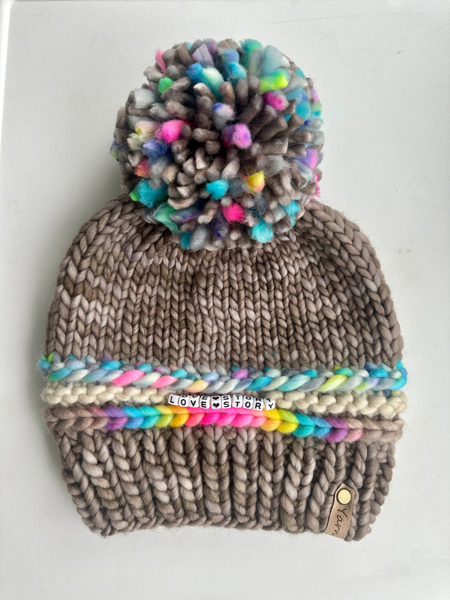 Friendship bracelet merino wool knit hat with merino wool pom