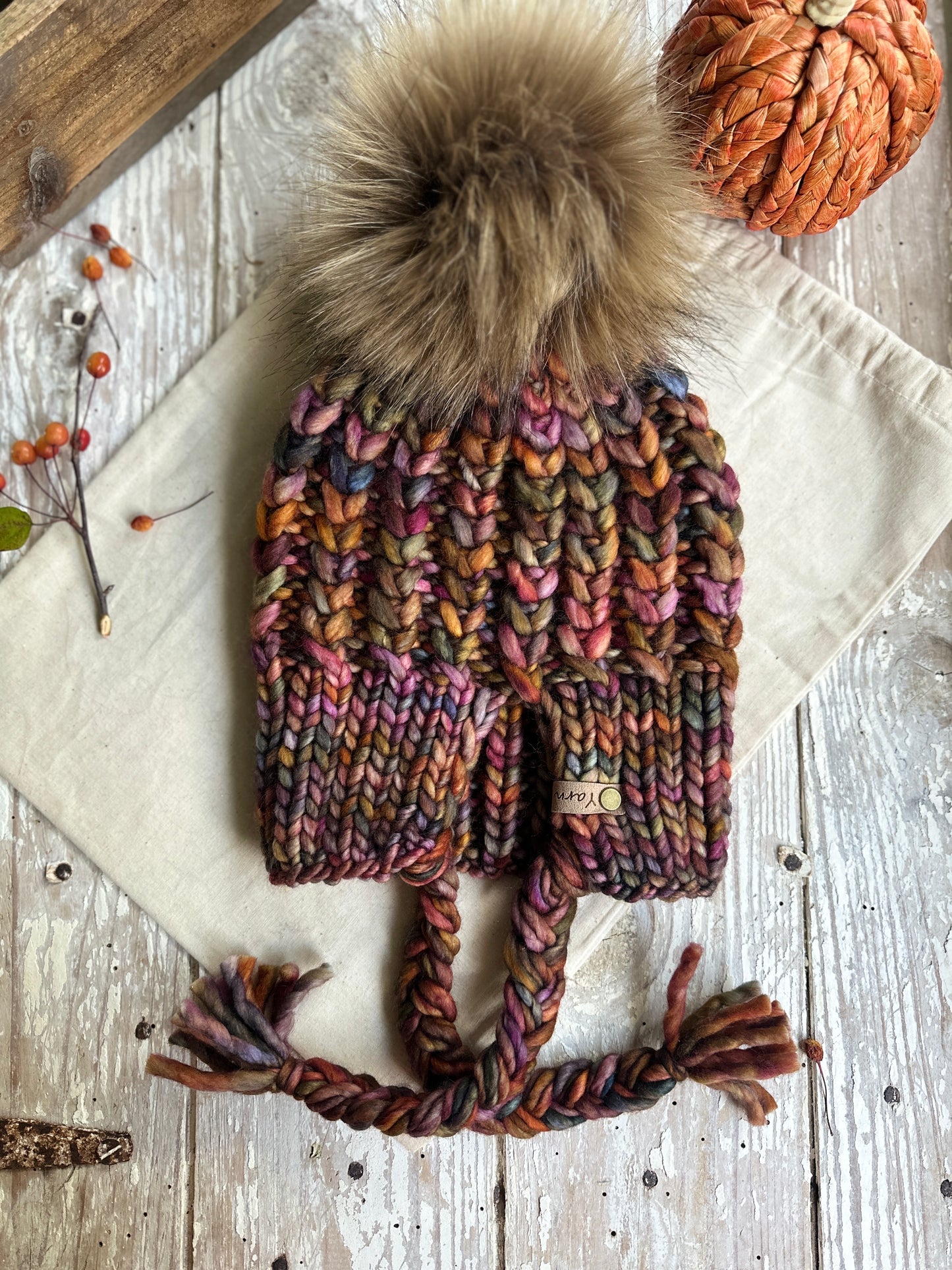 Merino wool split brim knit hat with faux fur Pom