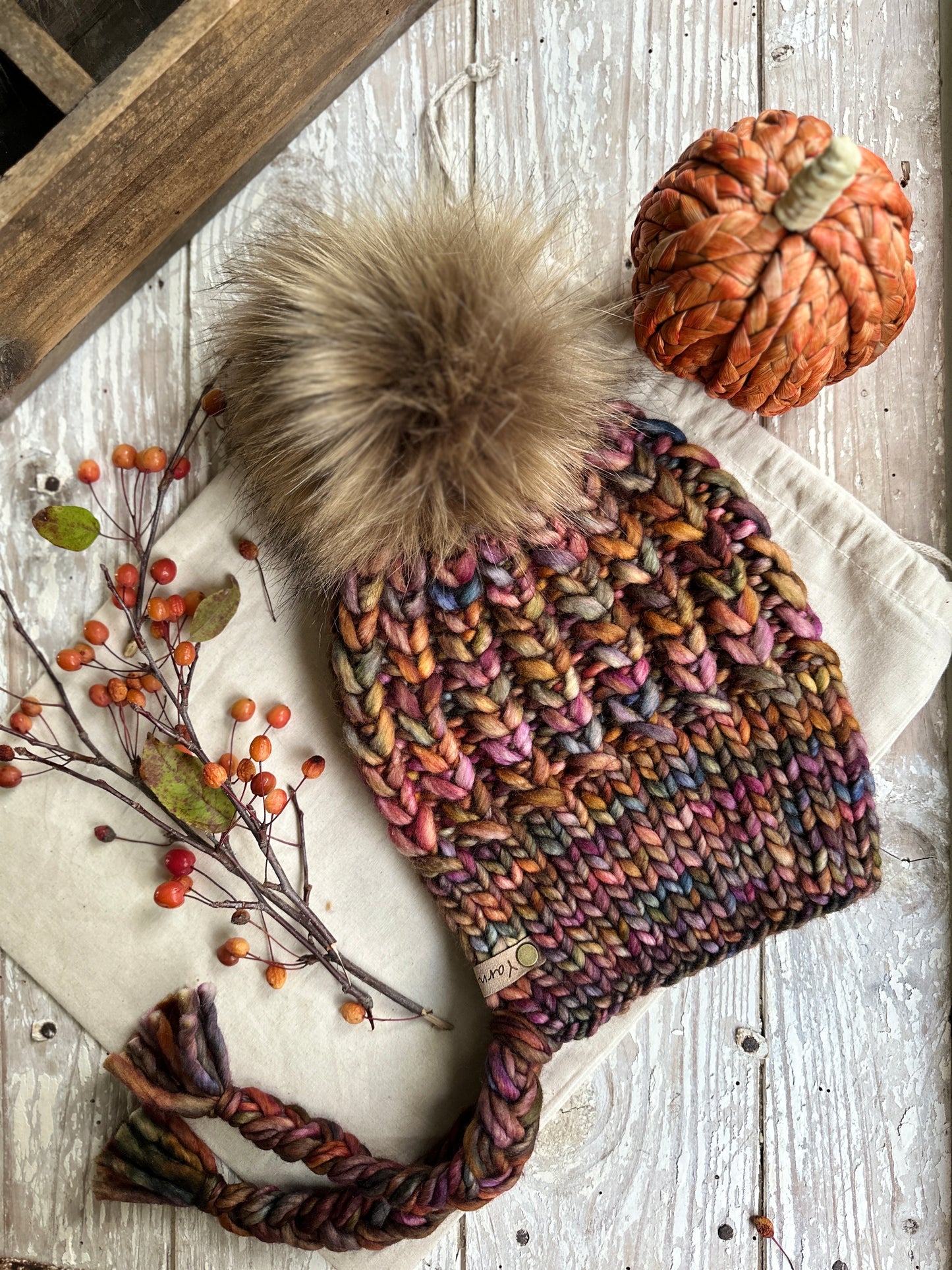 Merino wool split brim knit hat with faux fur Pom