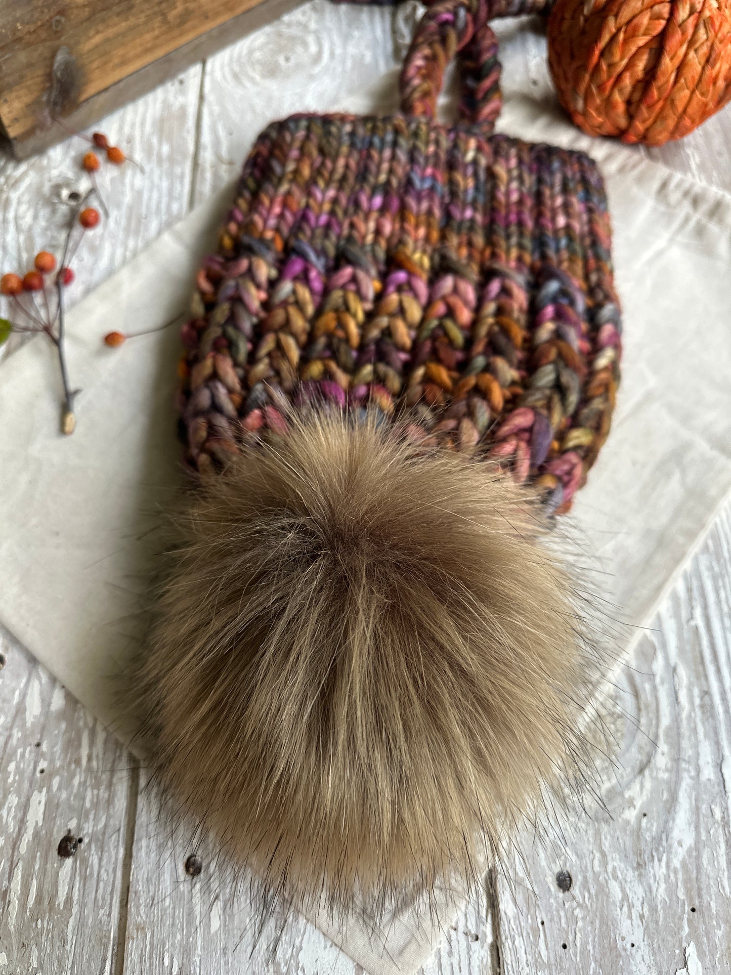 Merino wool split brim knit hat with faux fur Pom