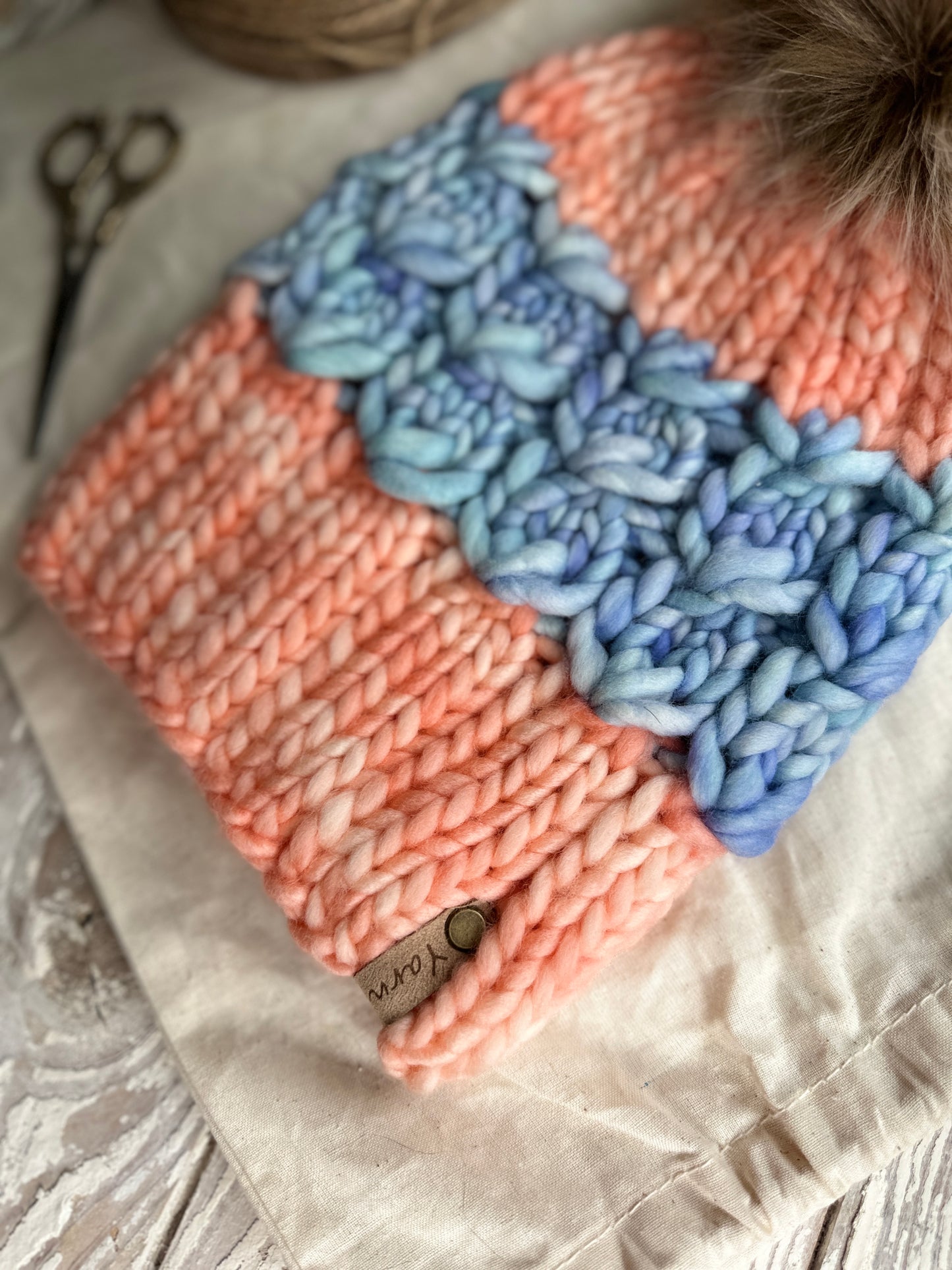 Merino wool knit hat with faux fur Pom