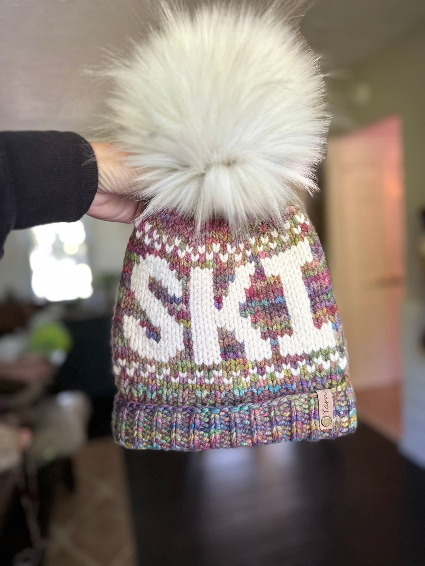 Merino wool knit hat with faux fur Pom