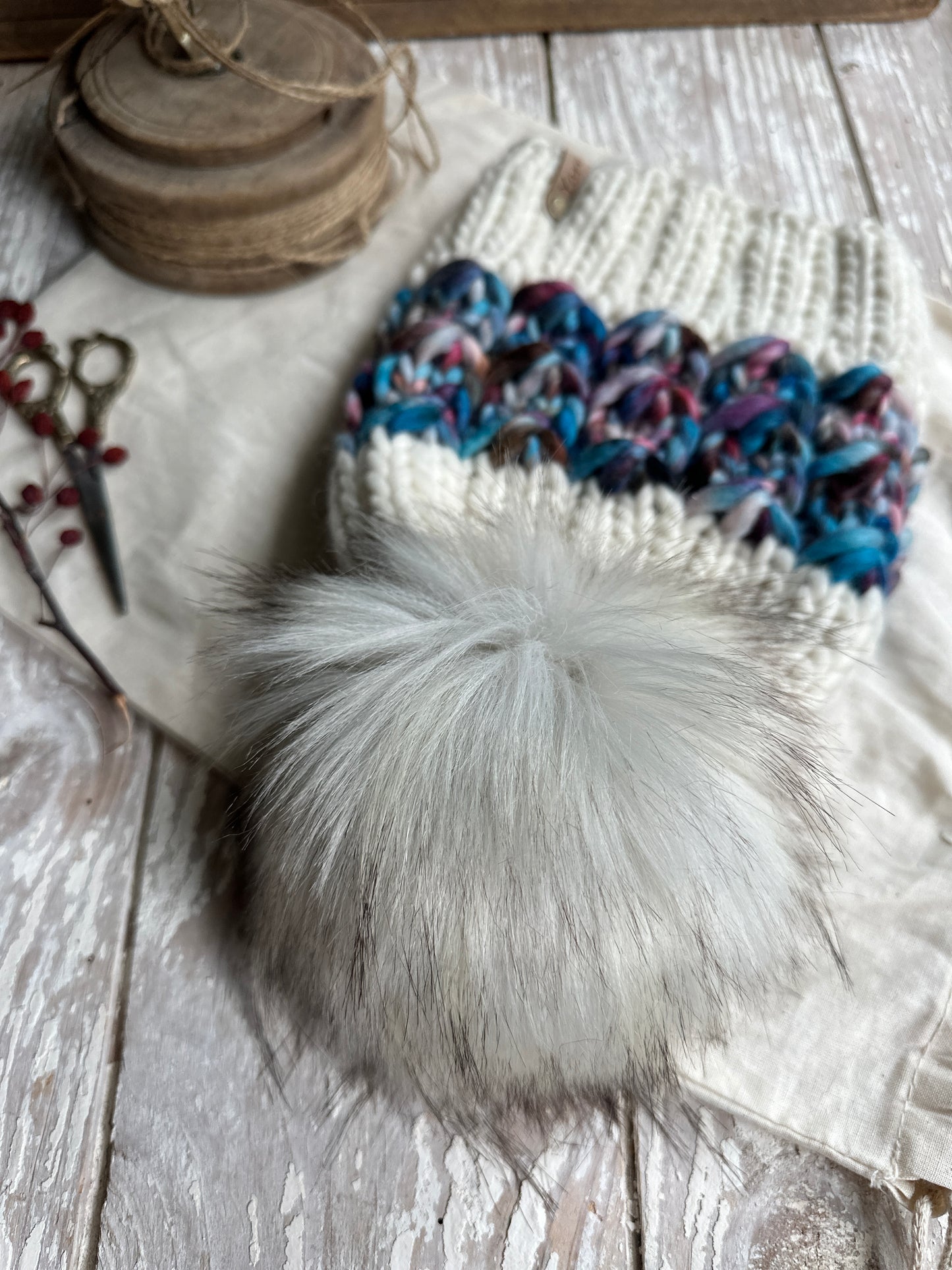 Merino wool knit hat with faux fur Pom