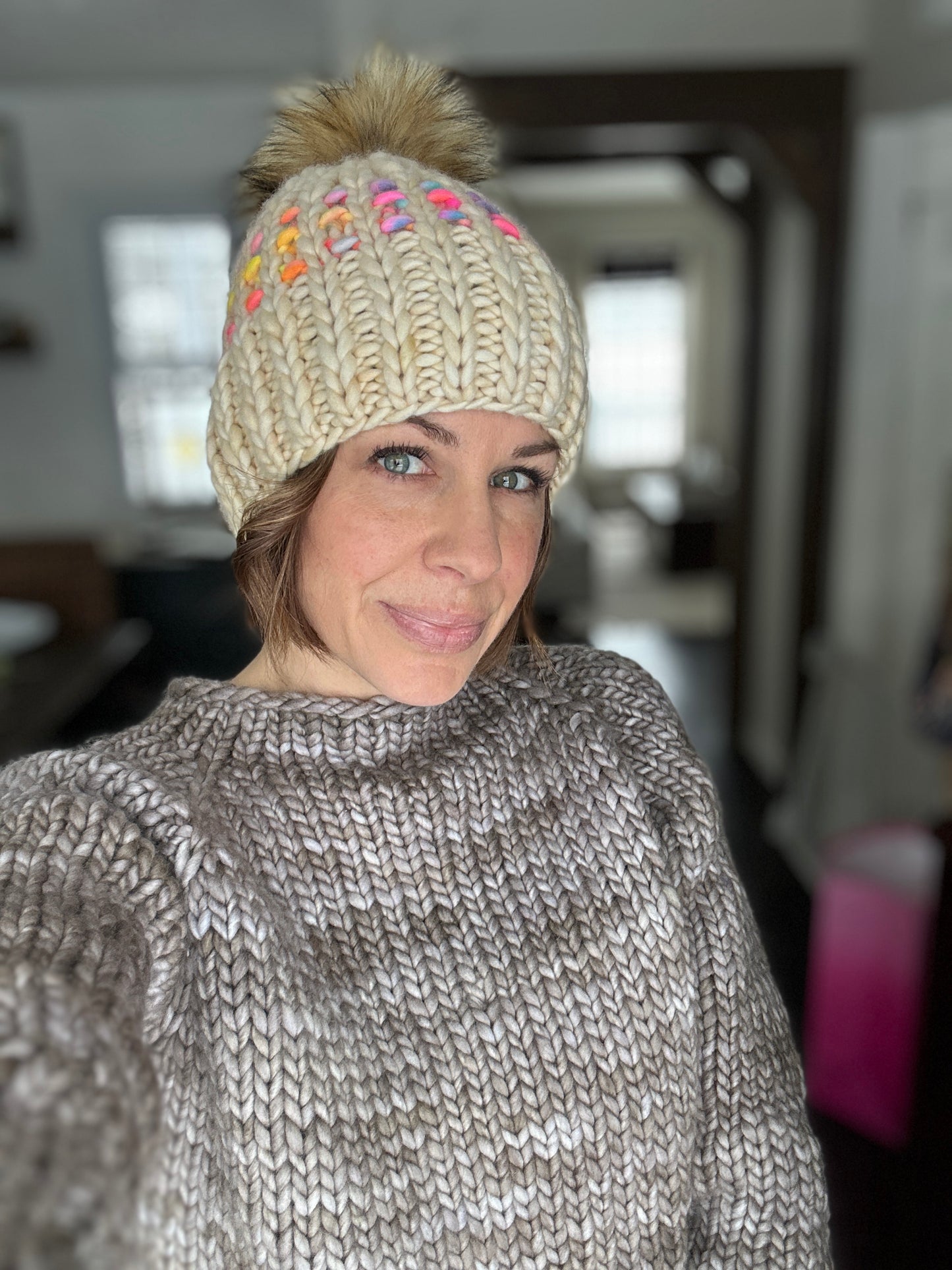 Merino wool knit hat with faux fur Pom