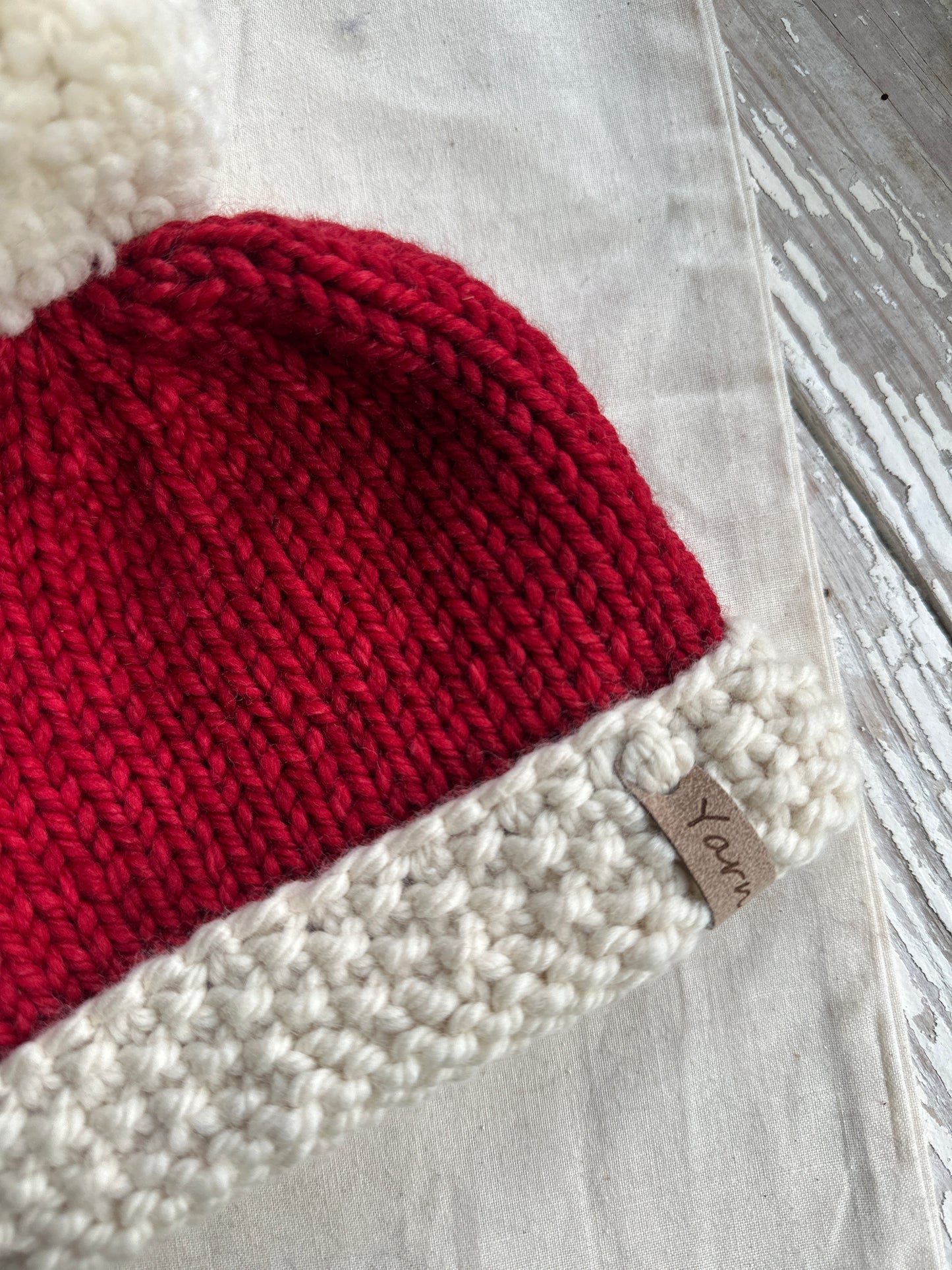 Baby-3 month merino wool knit hat with yarn Pom