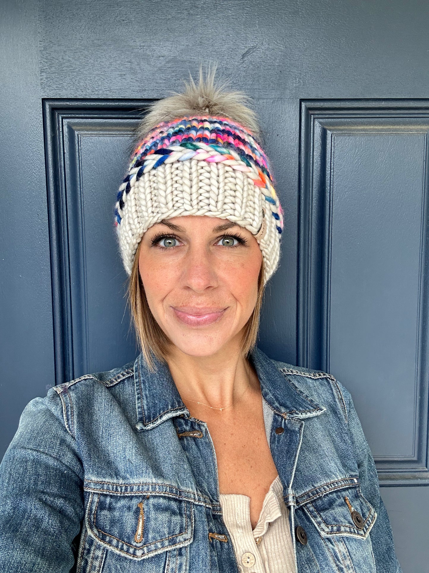Merino wool knit hat with faux fur Pom