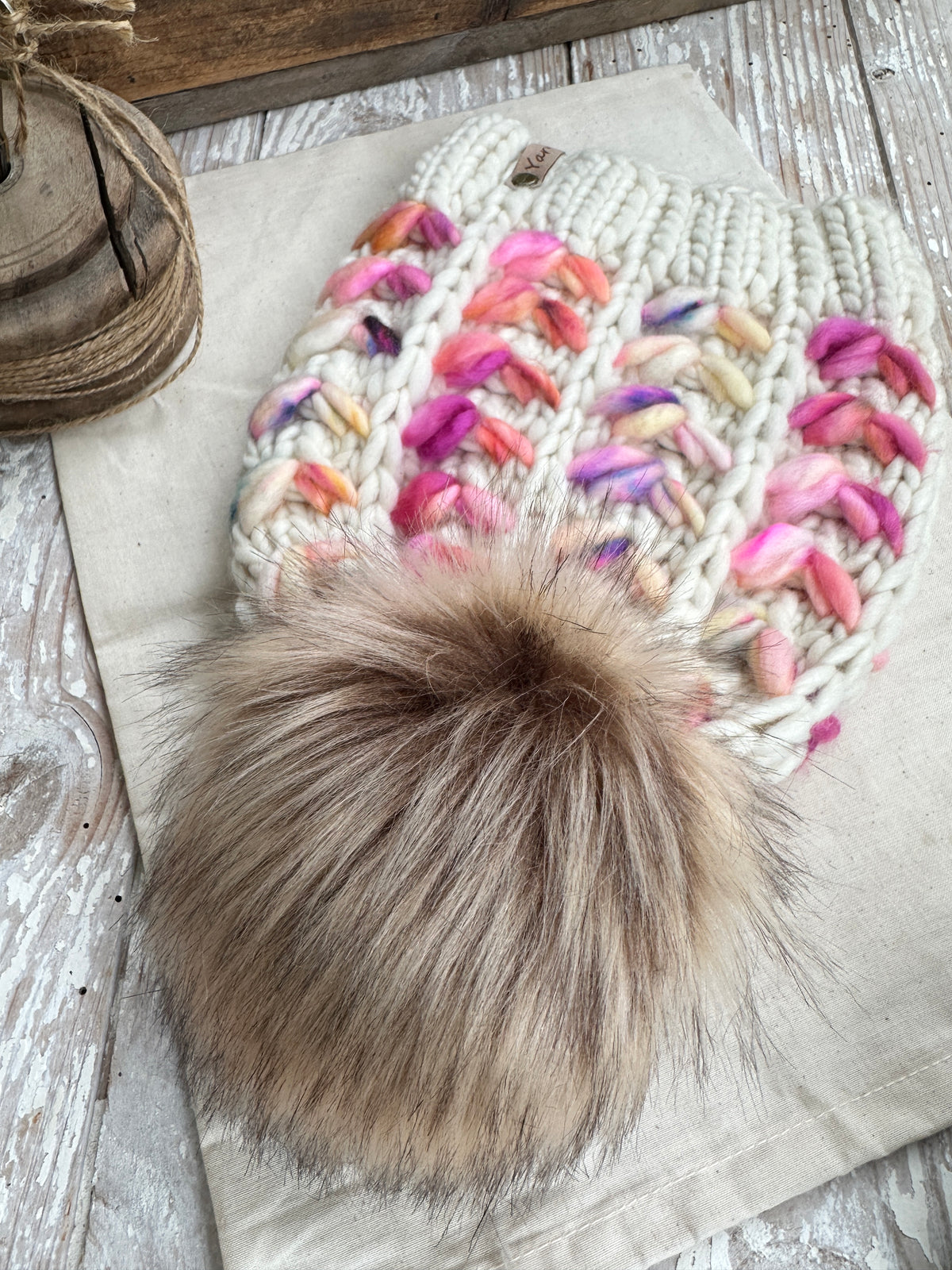 Merino wool knit hat with faux fur Pom
