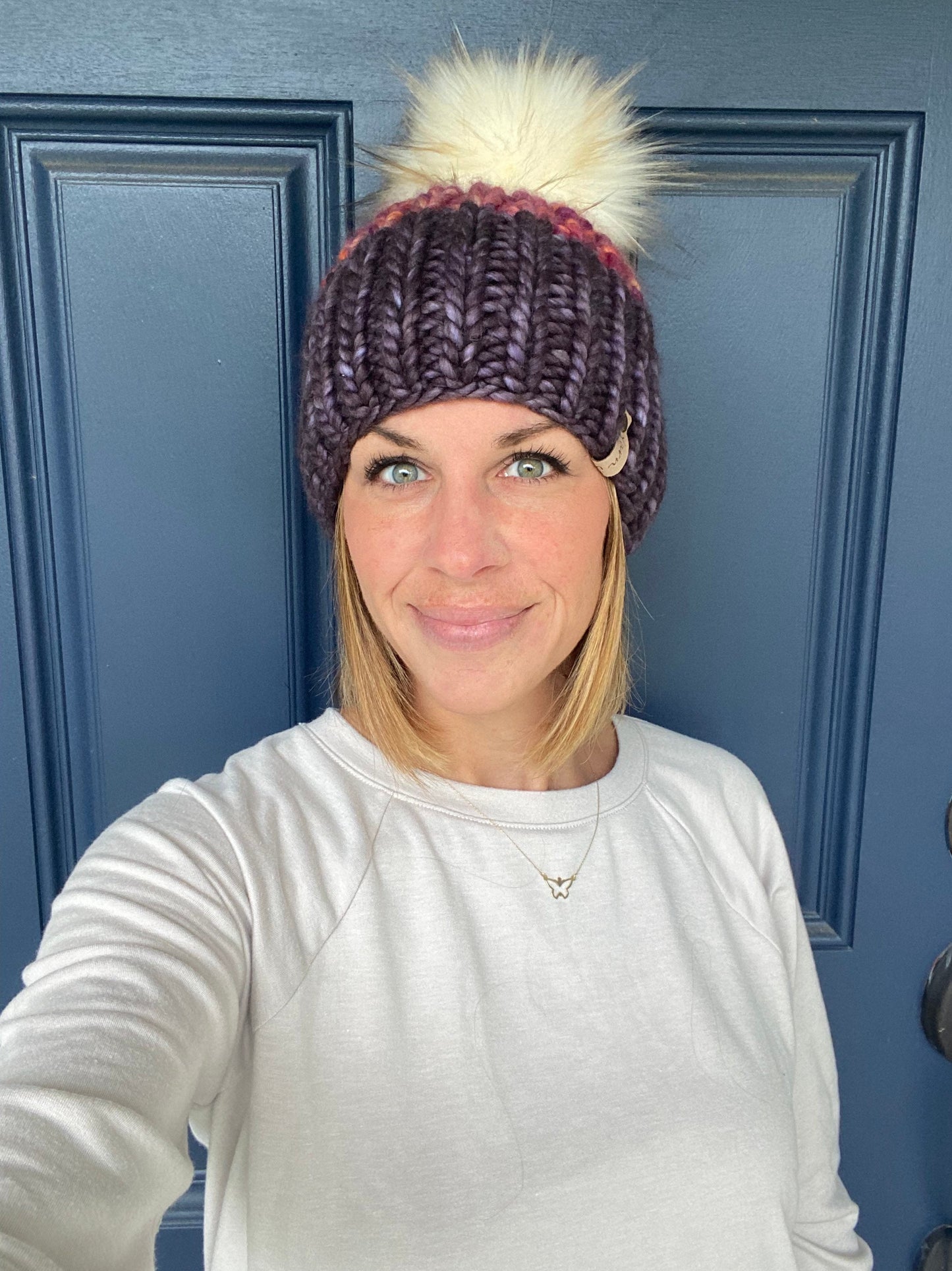 Merino wool knithat with faux fur Pom