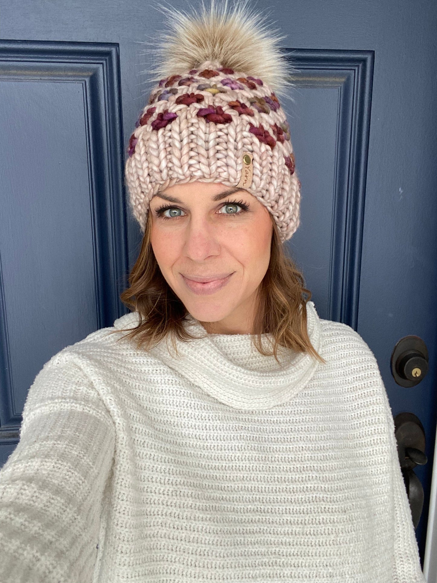 Merino wool knit hat with faux fur Pom