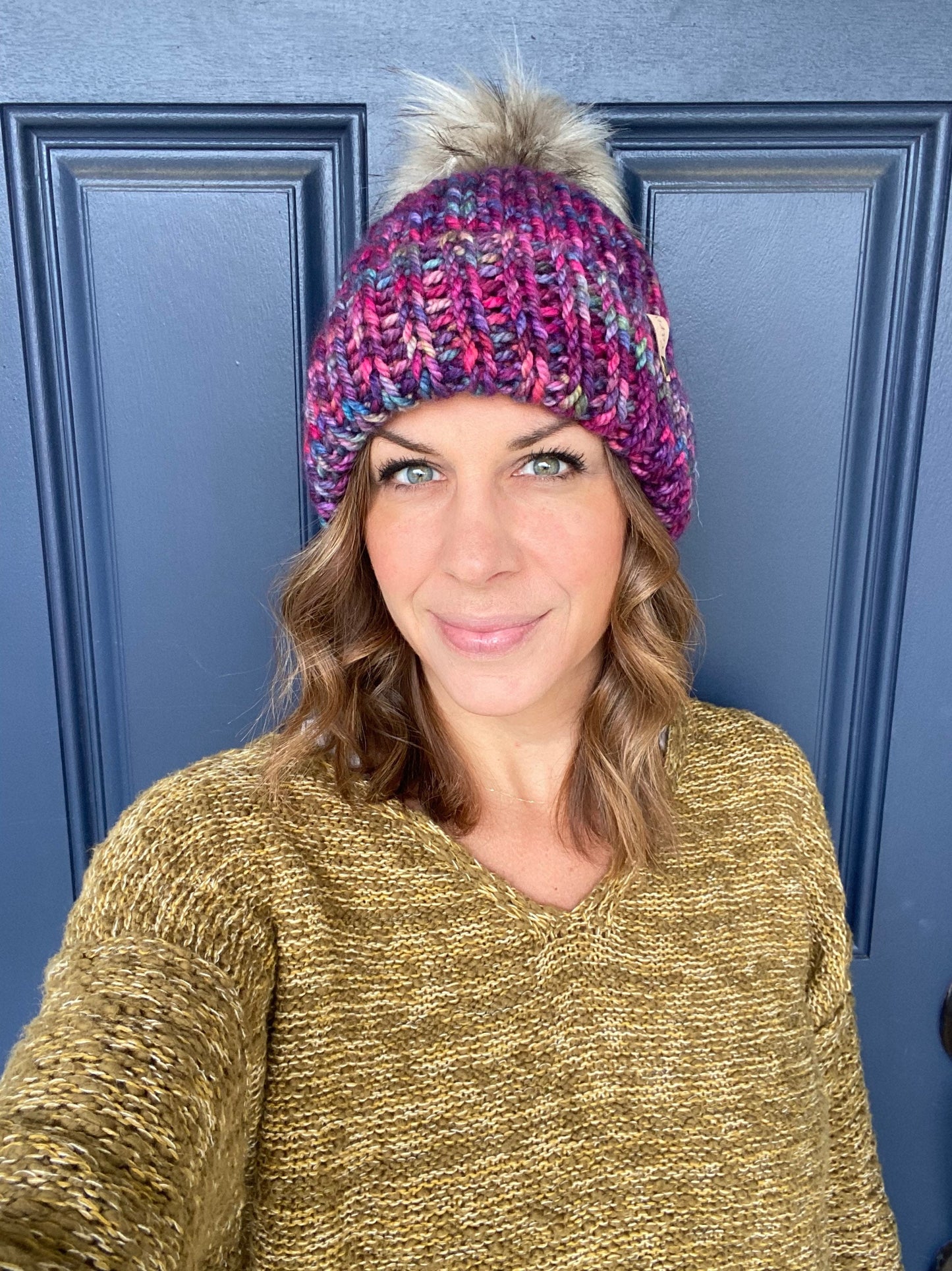 Merino wool folded brim knit hat with faux fur Pom