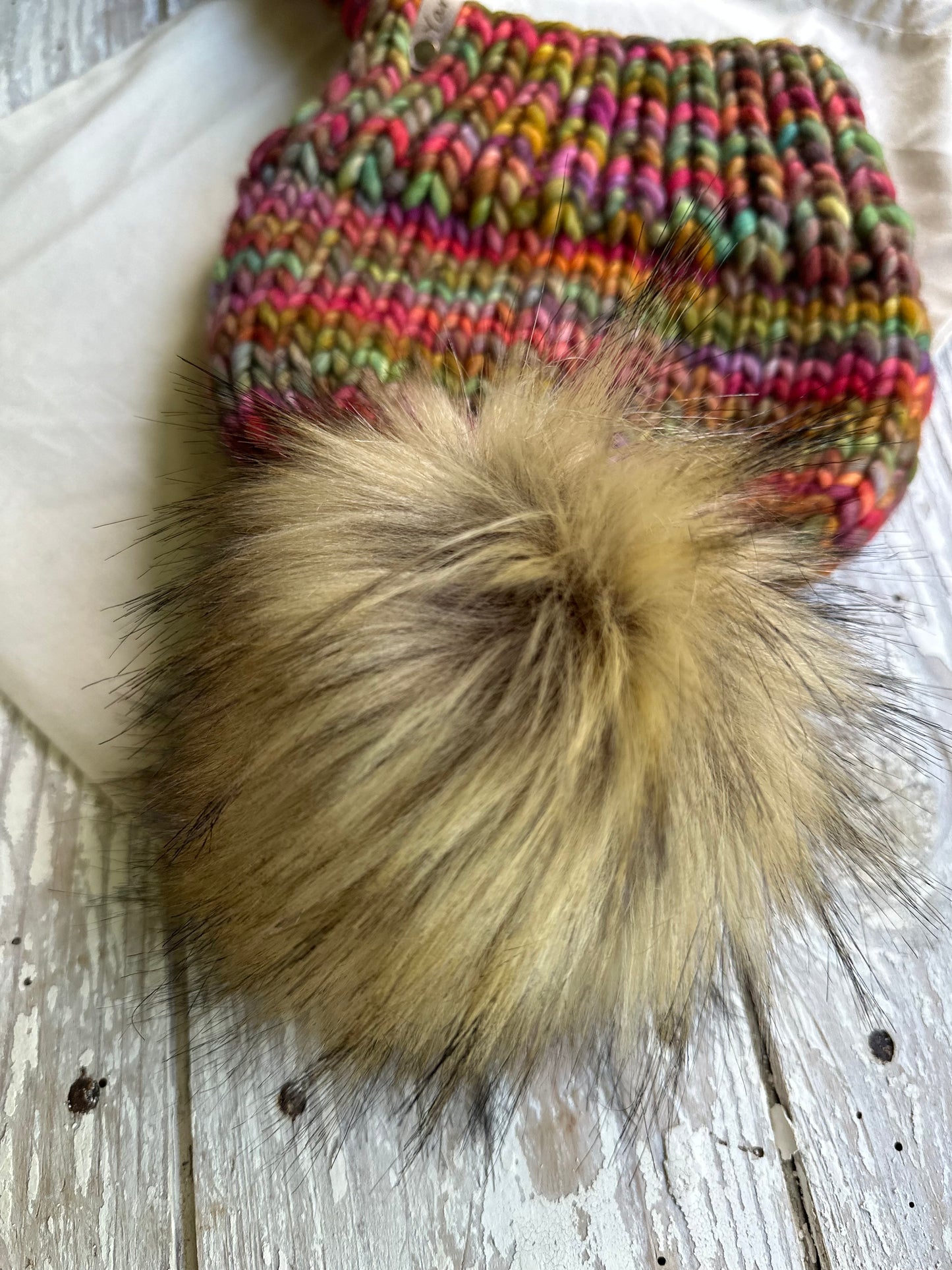Merino wool split brim beanie with faux fur pom