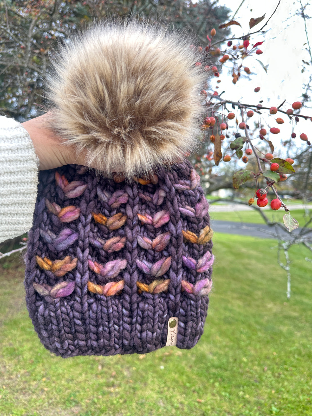 Merino wool knit hat with faux fur Pom