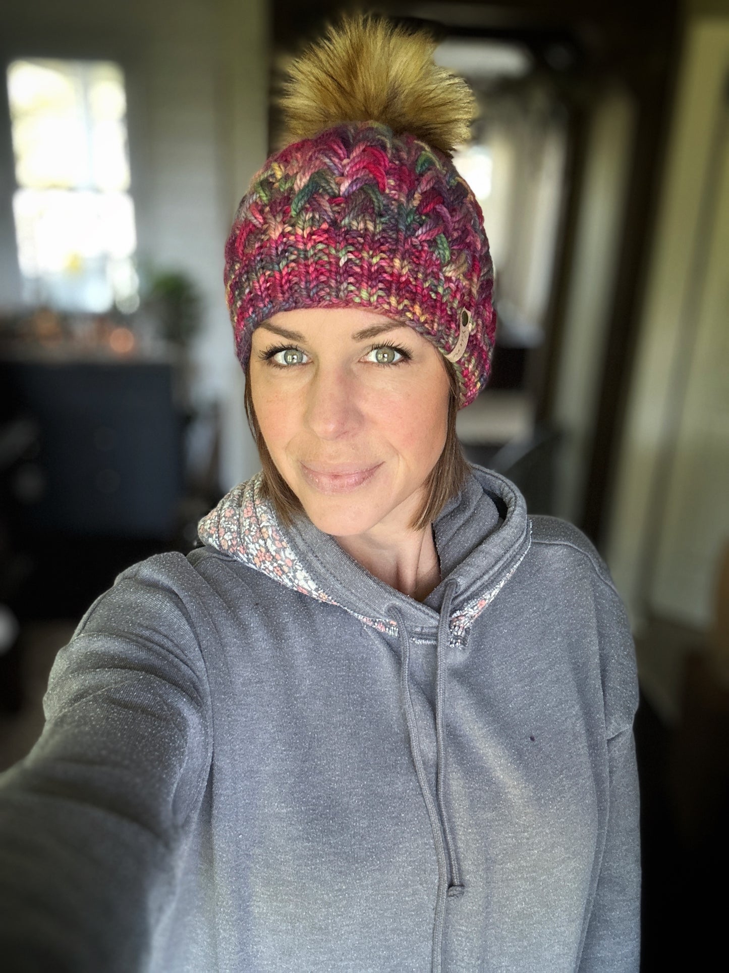 Merino wool knit hat with faux fur Pom