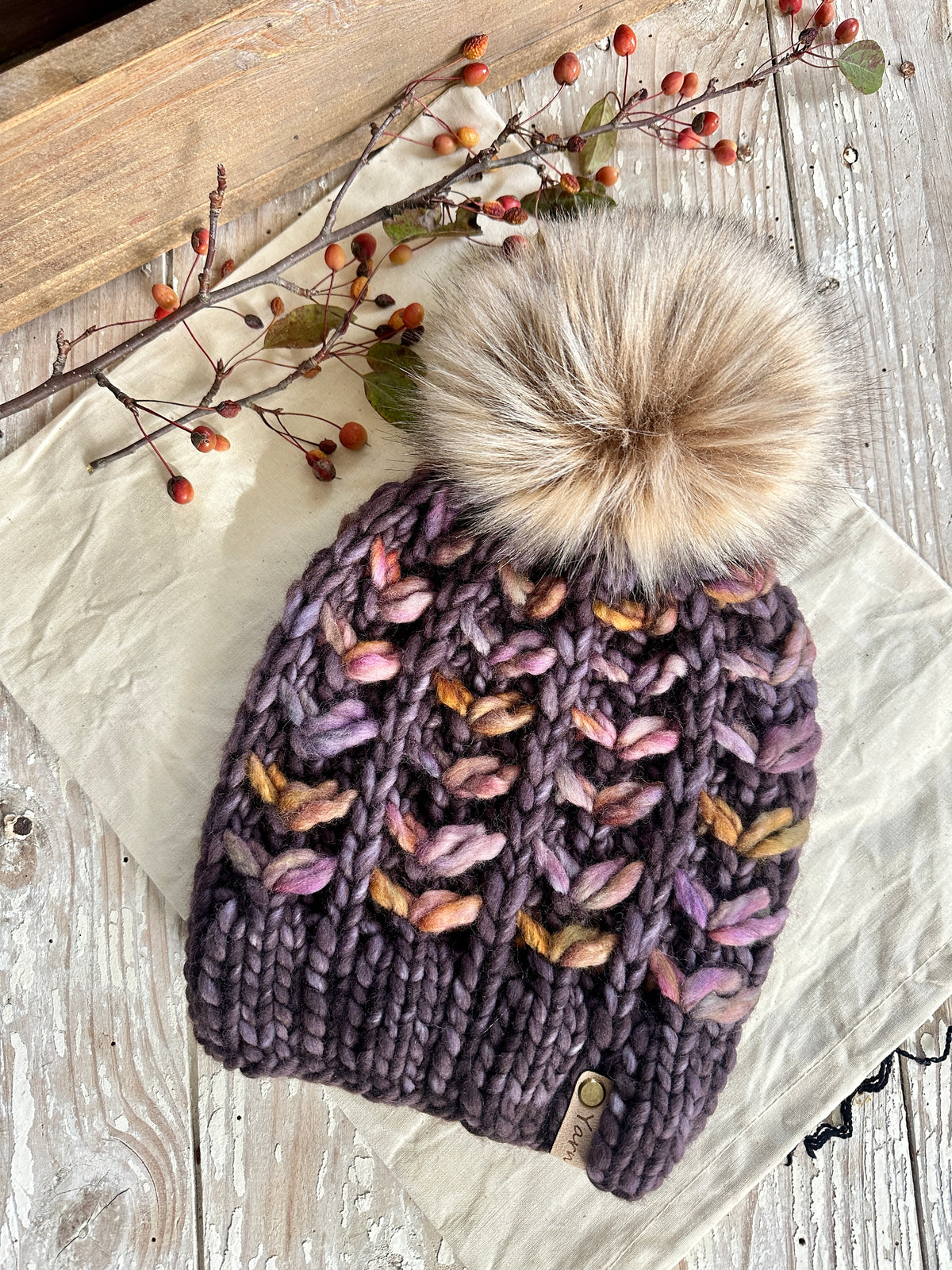 Merino wool knit hat with faux fur Pom