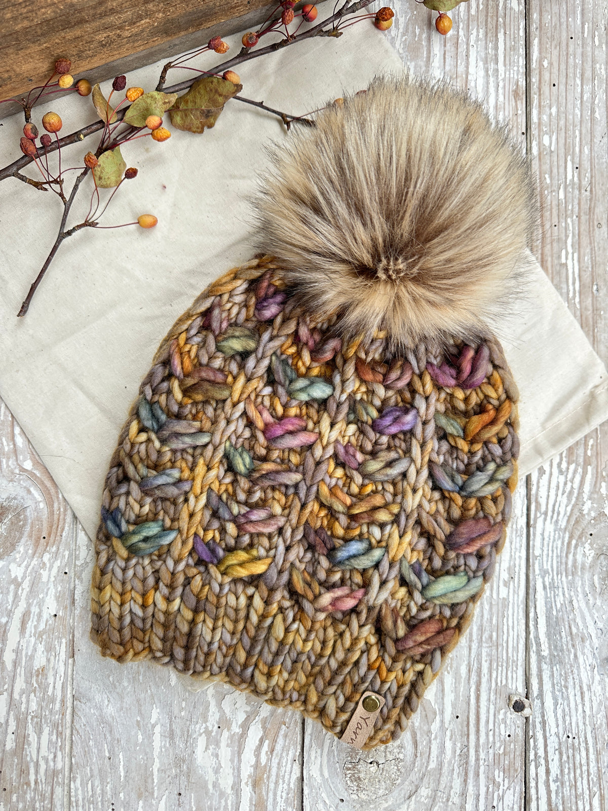 Merino wool knit hat with faux fur Pom
