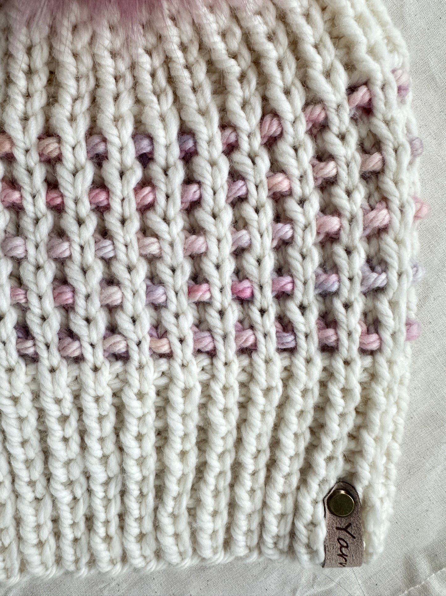 Merino wool knit hat with faux fur Pom