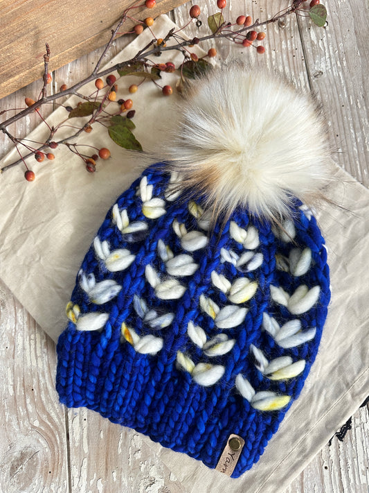 Merino wool knit hat with faux fur Pom