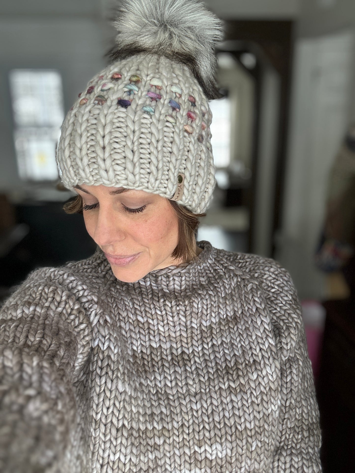 Merino wool knit hat with faux fur Pom