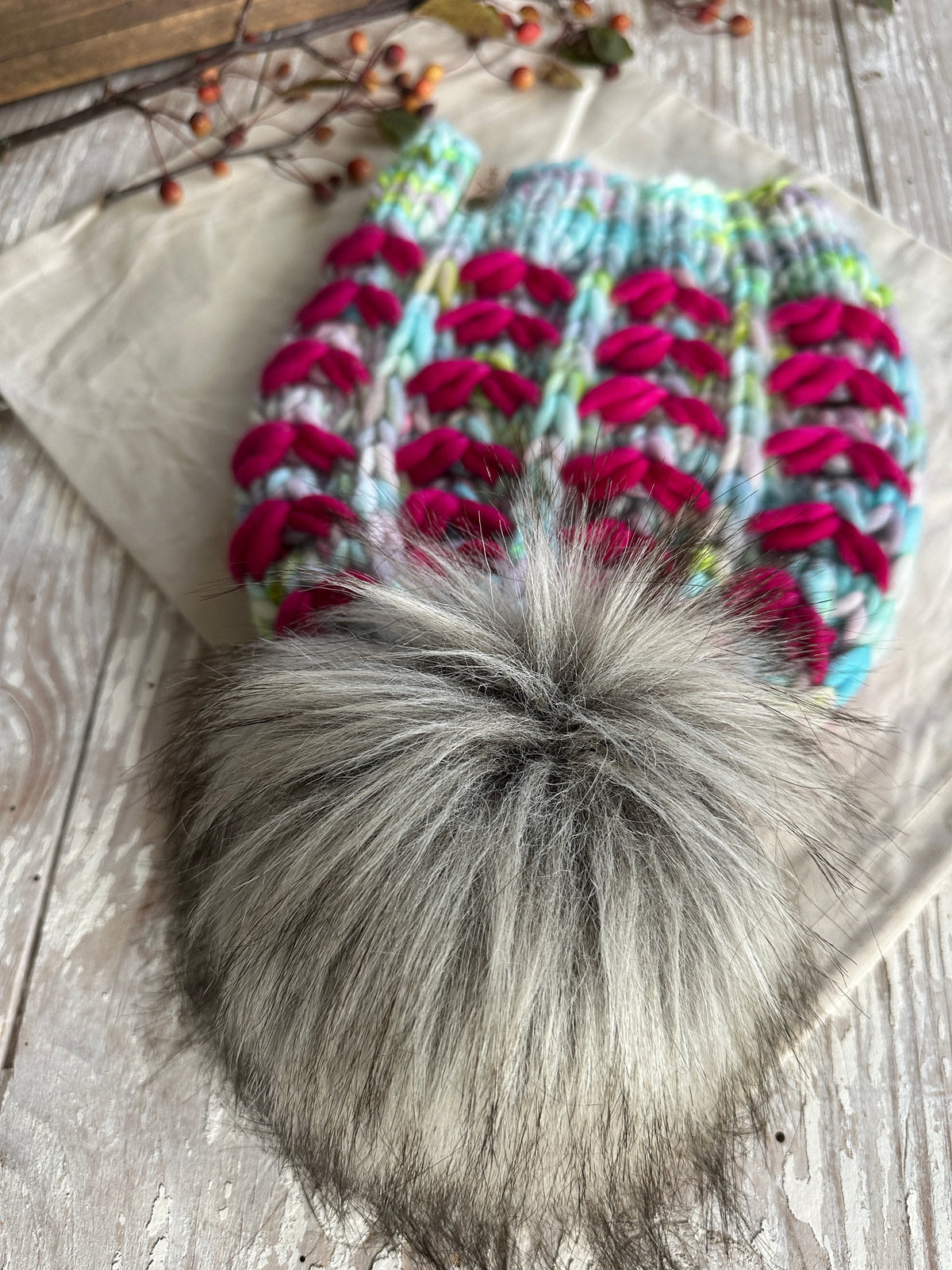 Merino wool knit hat with faux fur Pom