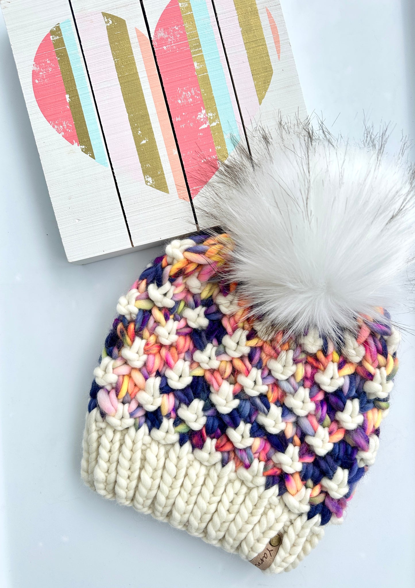 Merino wool knit hat with faux fur Pom
