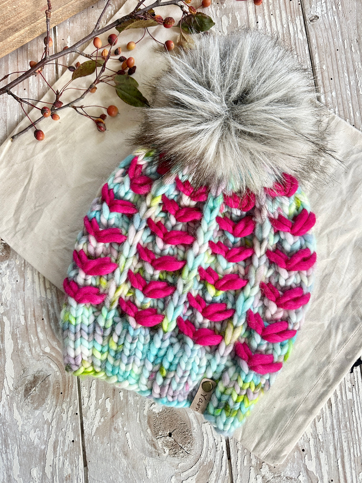 Merino wool knit hat with faux fur Pom