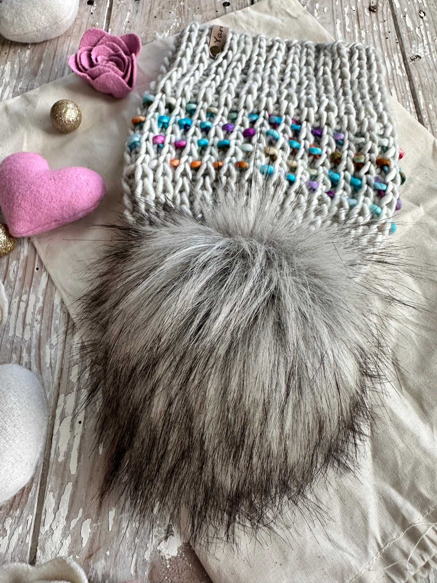Merino wool knit hat with faux fur Pom