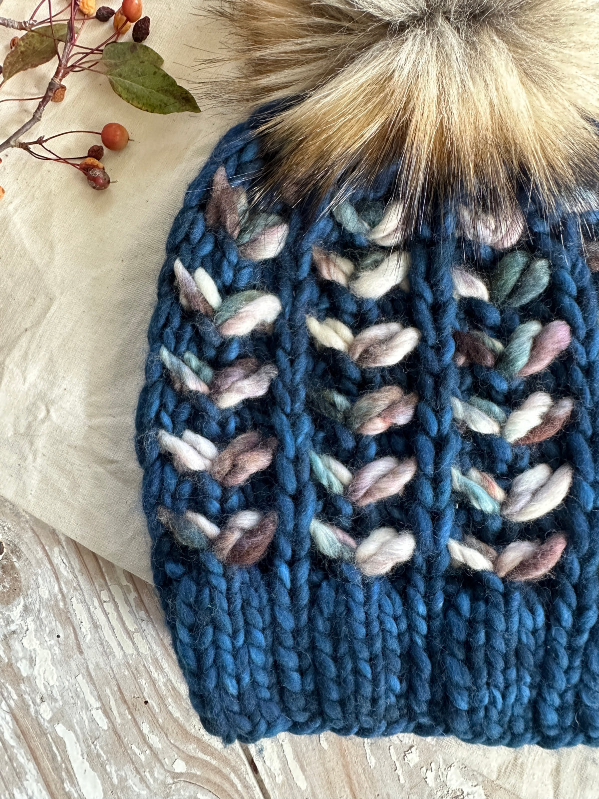 Merino wool knit hat with faux fur Pom