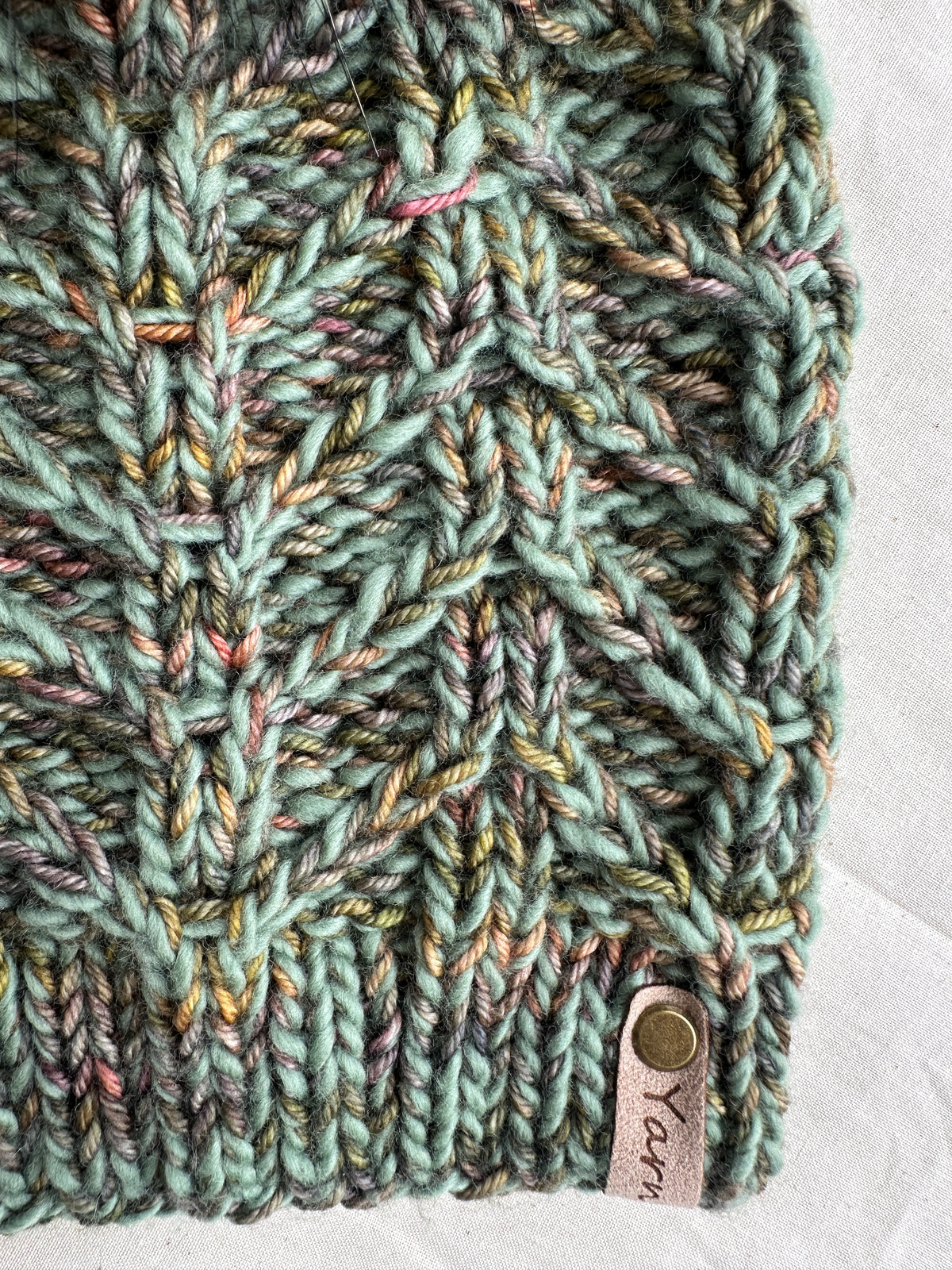 Merino wool knit hat with faux fur Pom