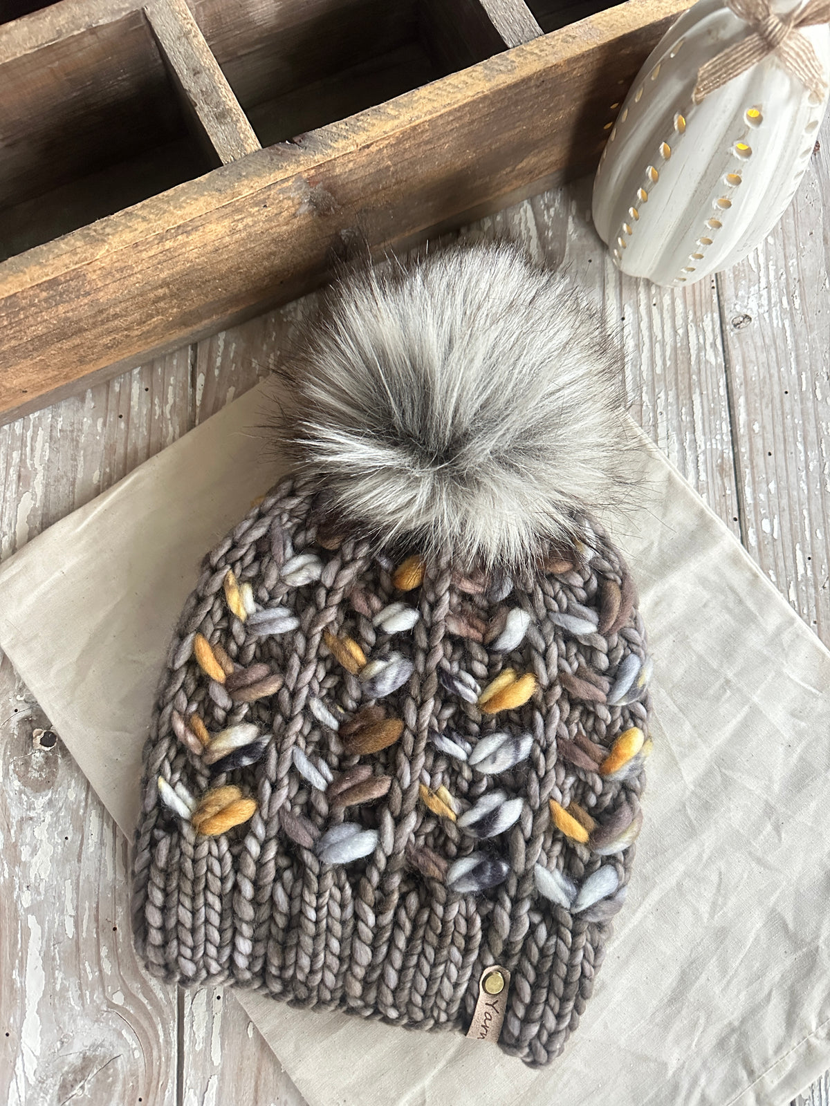Merino wool knit hat with faux fur Pom