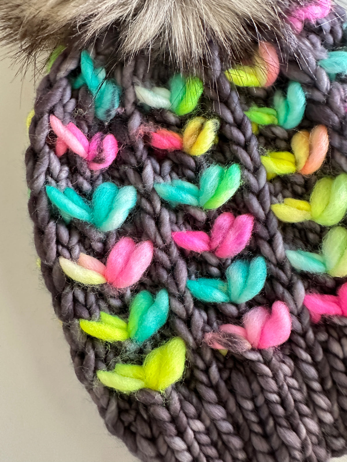 Merino wool knit hat with faux fur Pom