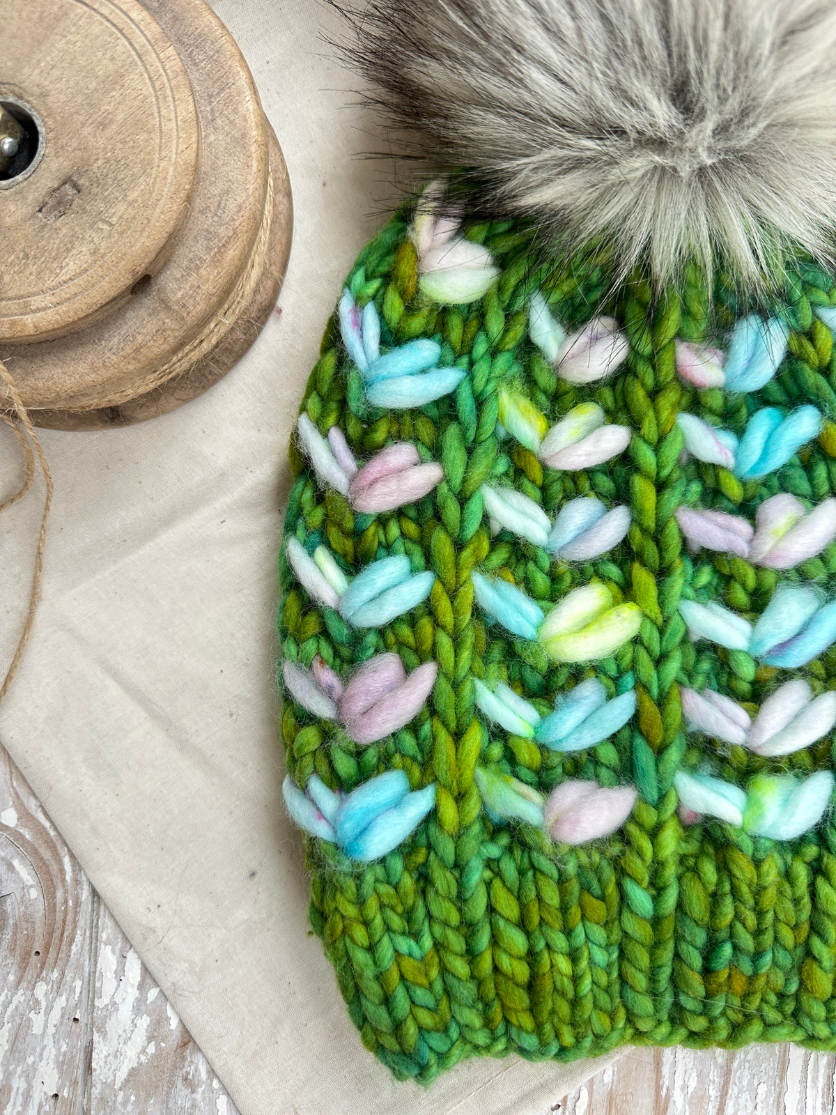Merino wool knit hat with faux fur Pom