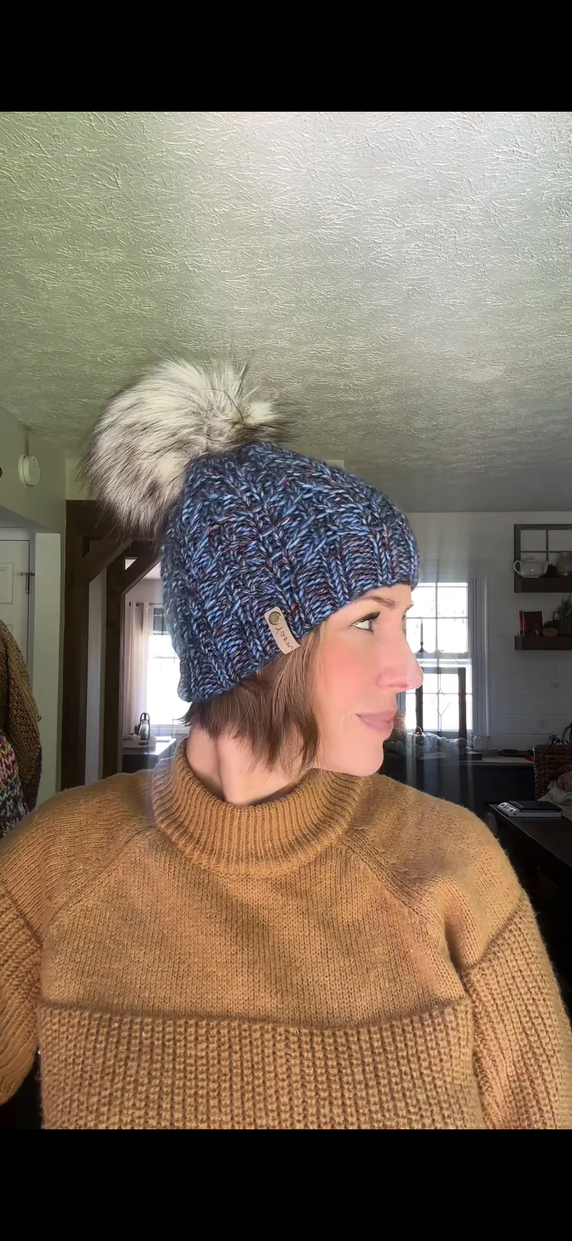Merino wool knit hat with faux fur Pom