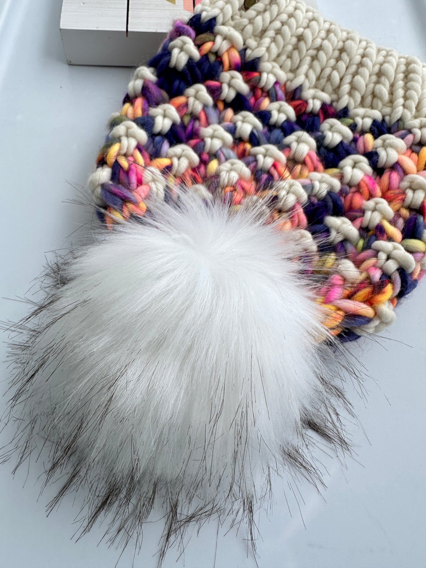 Merino wool knit hat with faux fur Pom