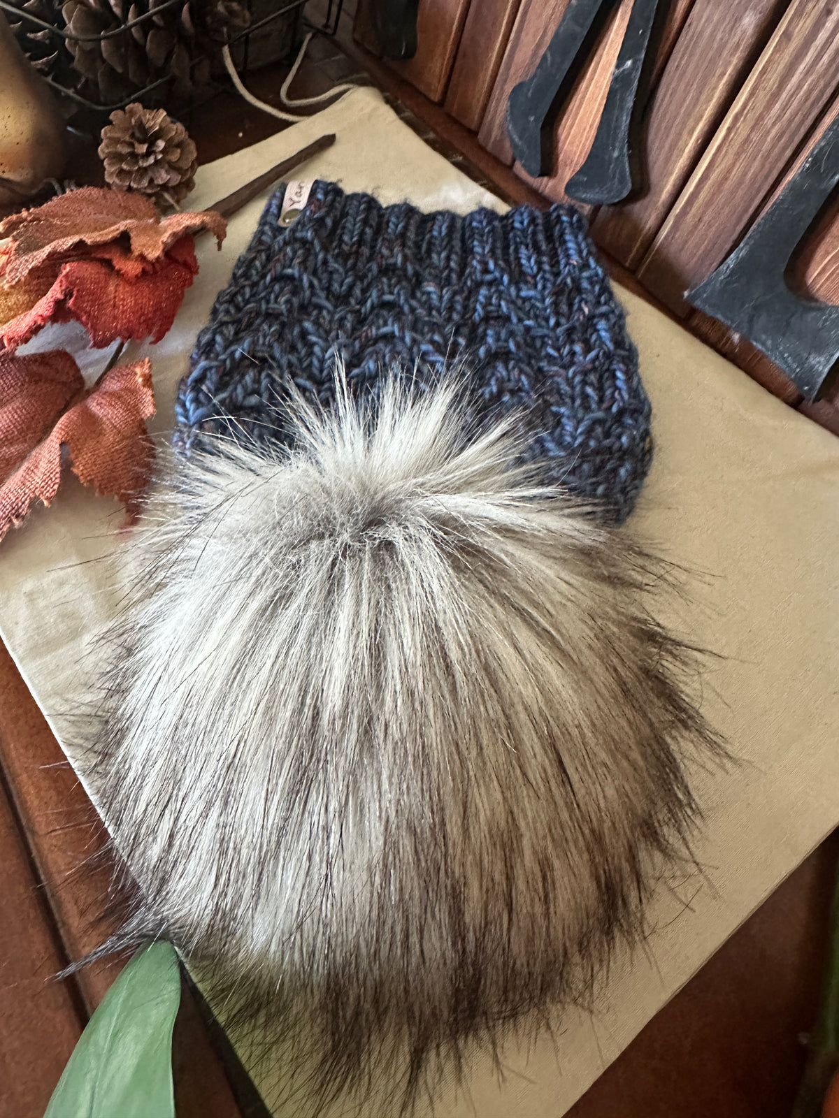Merino wool knit hat with faux fur Pom