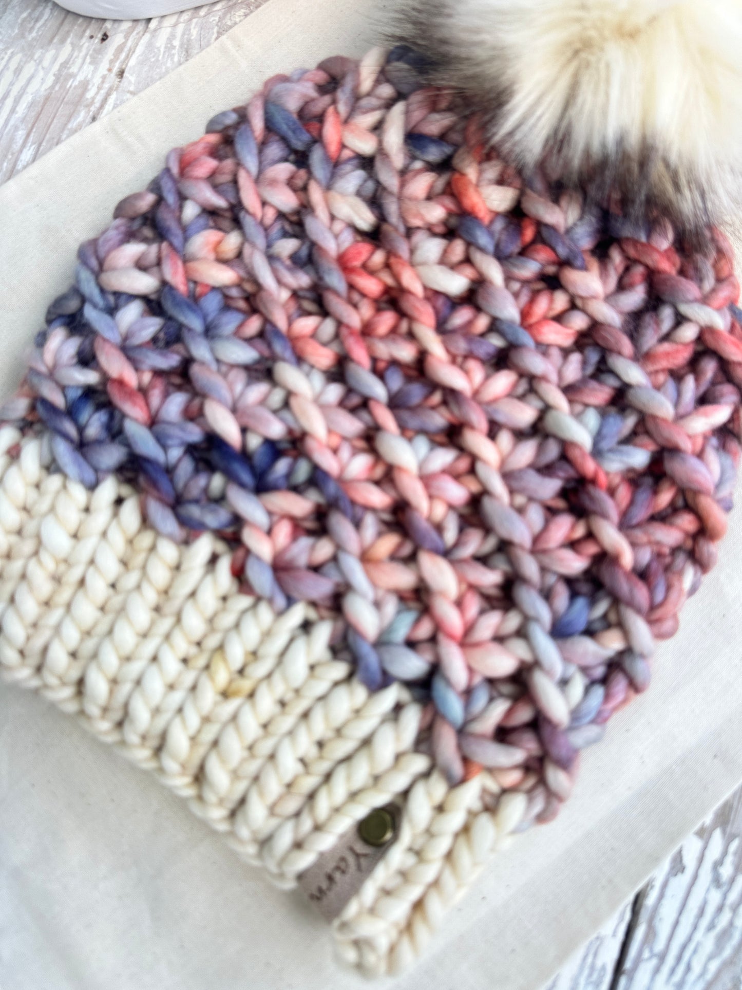 Merino wool knit hat with faux fur Pom