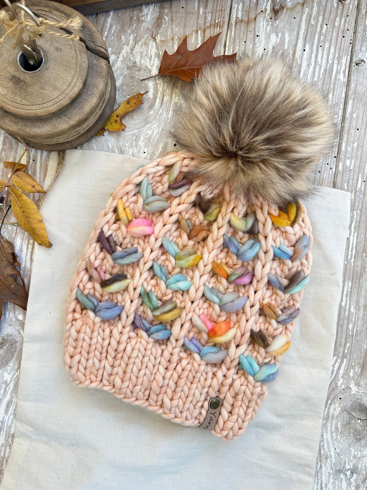 Merino wool knit hat with faux fur Pom