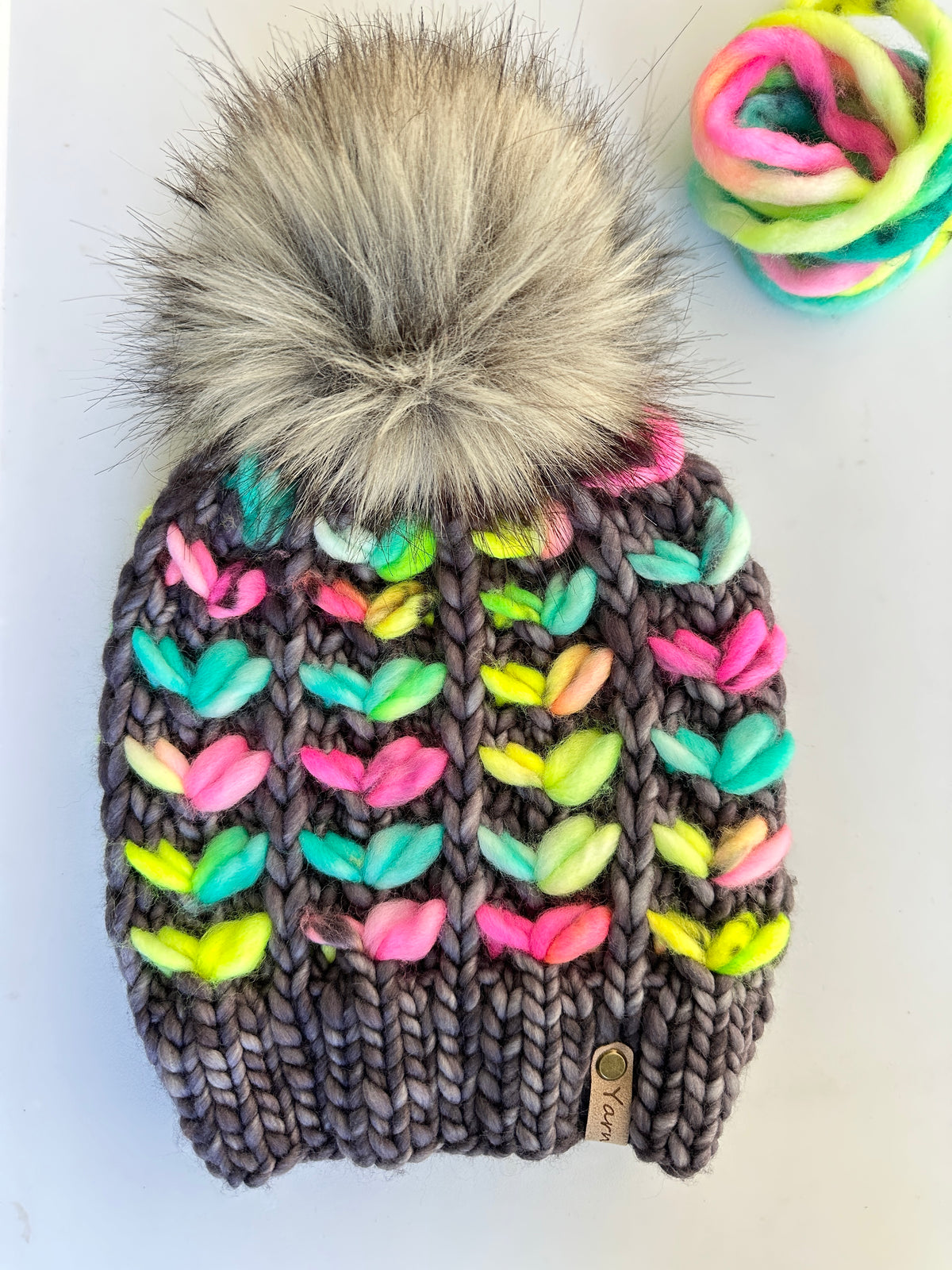 Merino wool knit hat with faux fur Pom