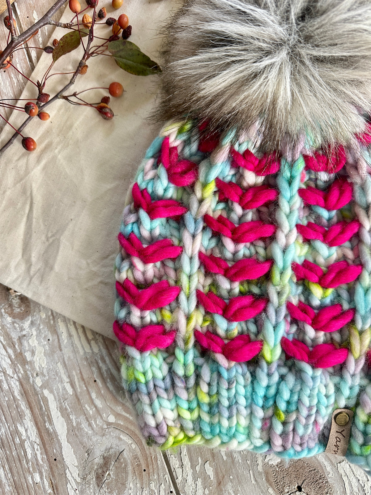 Merino wool knit hat with faux fur Pom