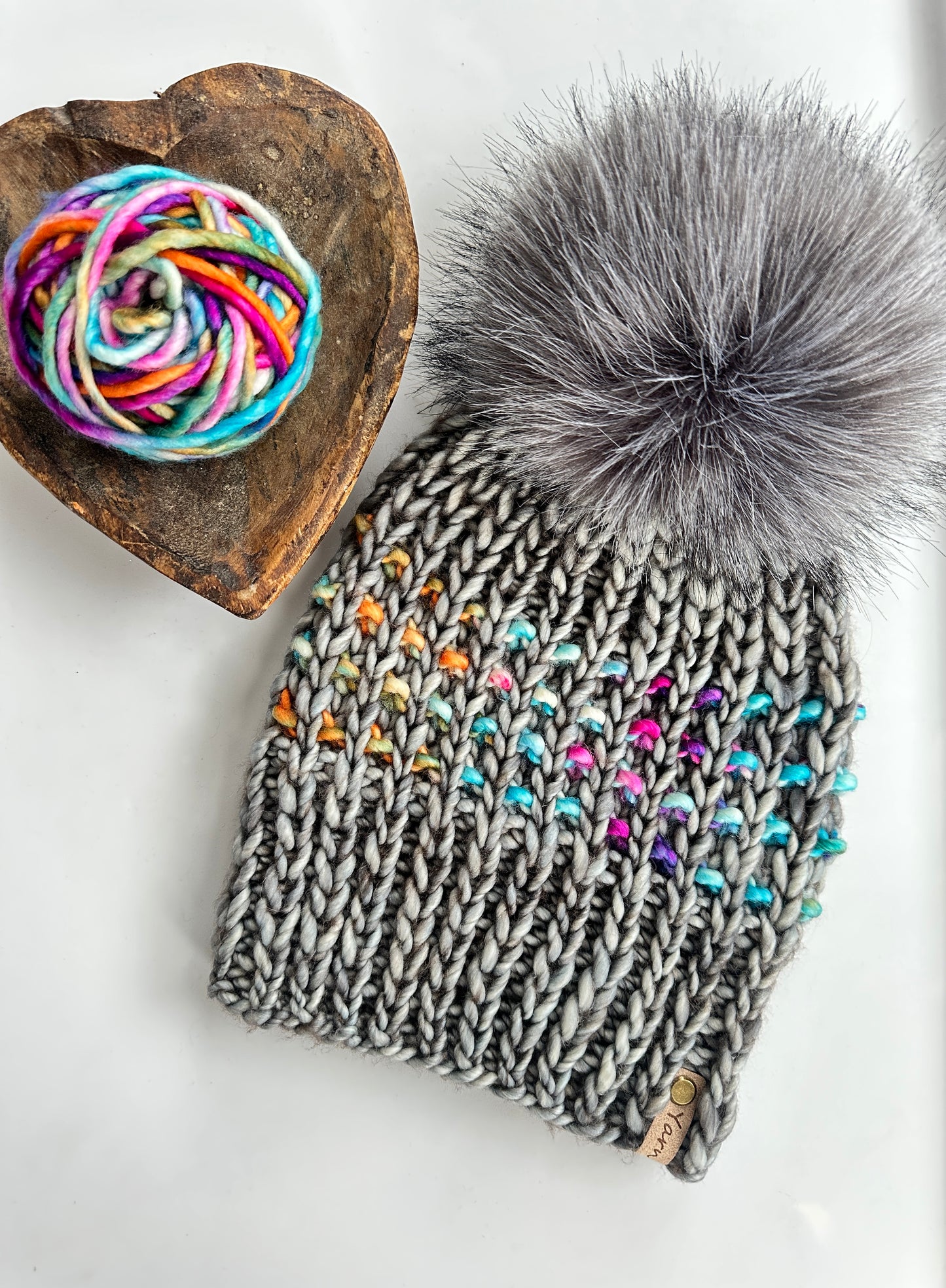 Merino wool knit hat with faux fur Pom