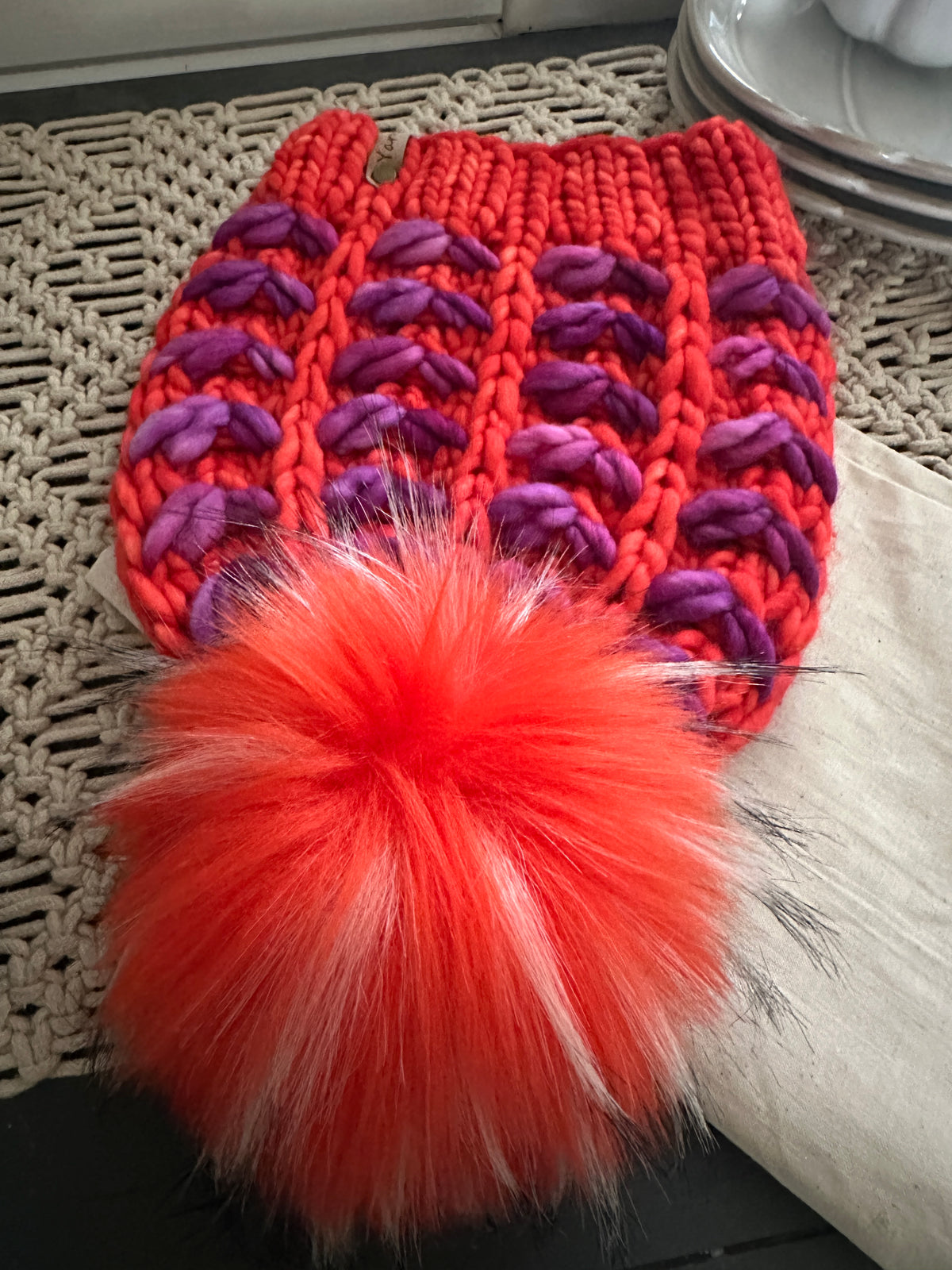 Merino wool knit hat with faux fur Pom