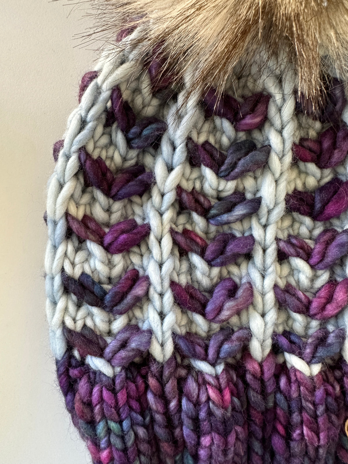 Merino wool knit hat with faux fur Pom